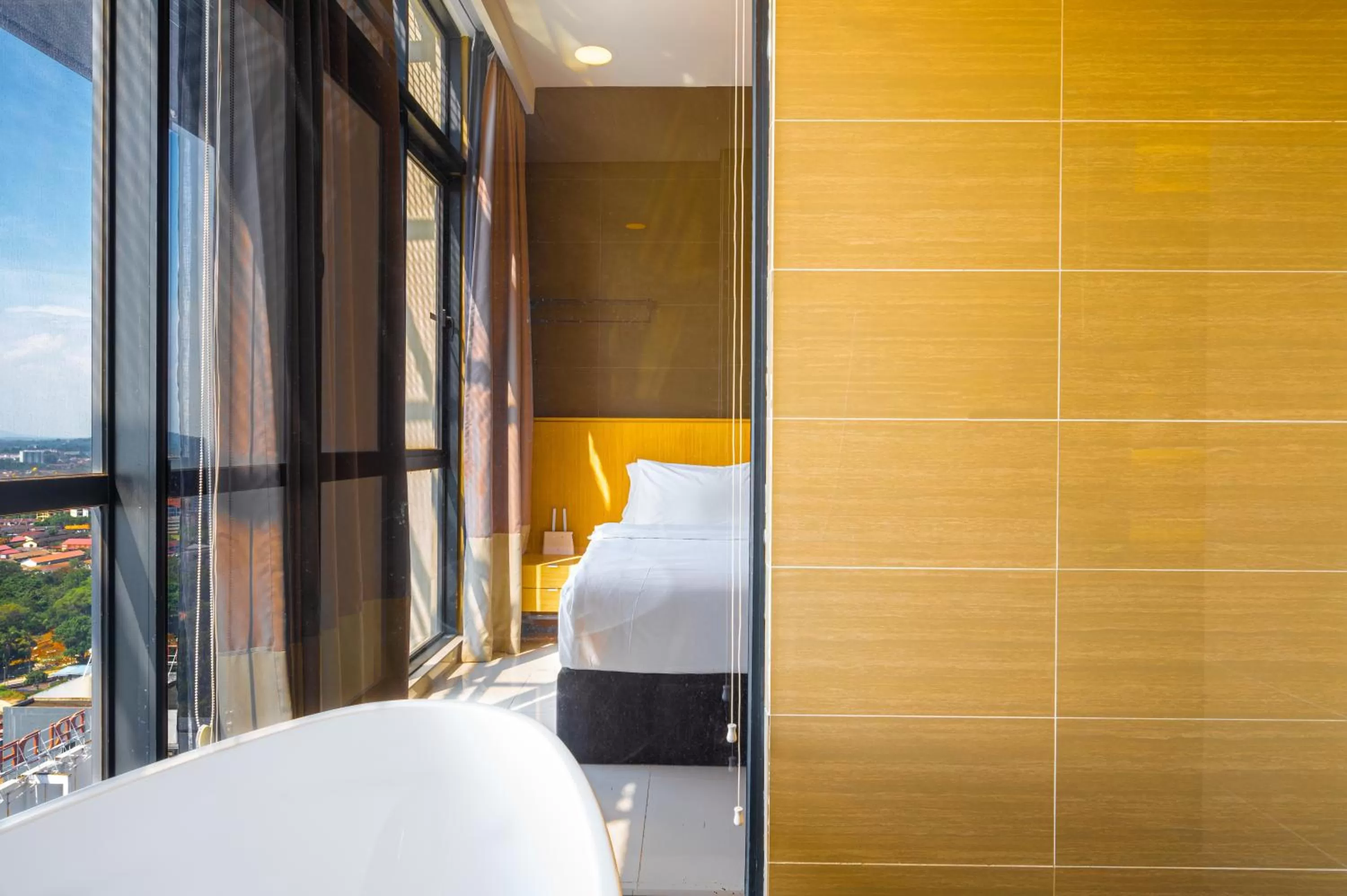 Bed in Greystone 99 Suites