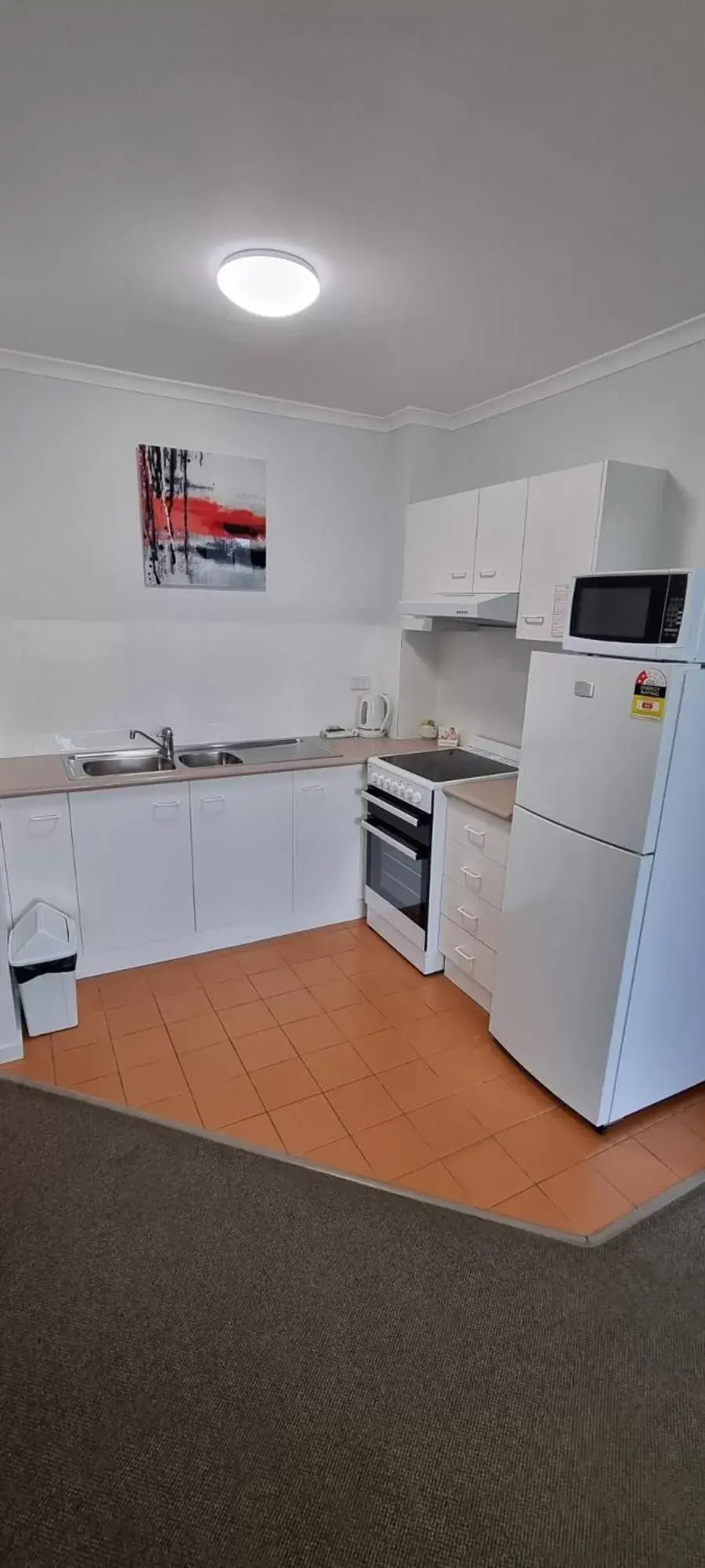 Kitchen/Kitchenette in Chasely Apartment Hotel