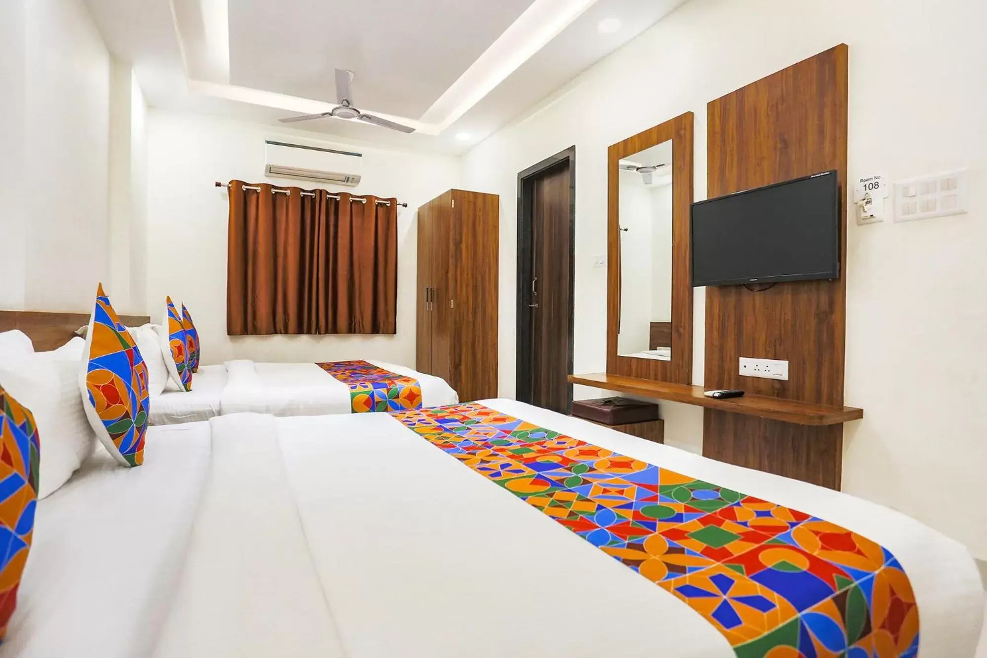 Bed in FabHotel Balaji Paradise Bed in FabHotel Balaji Paradise