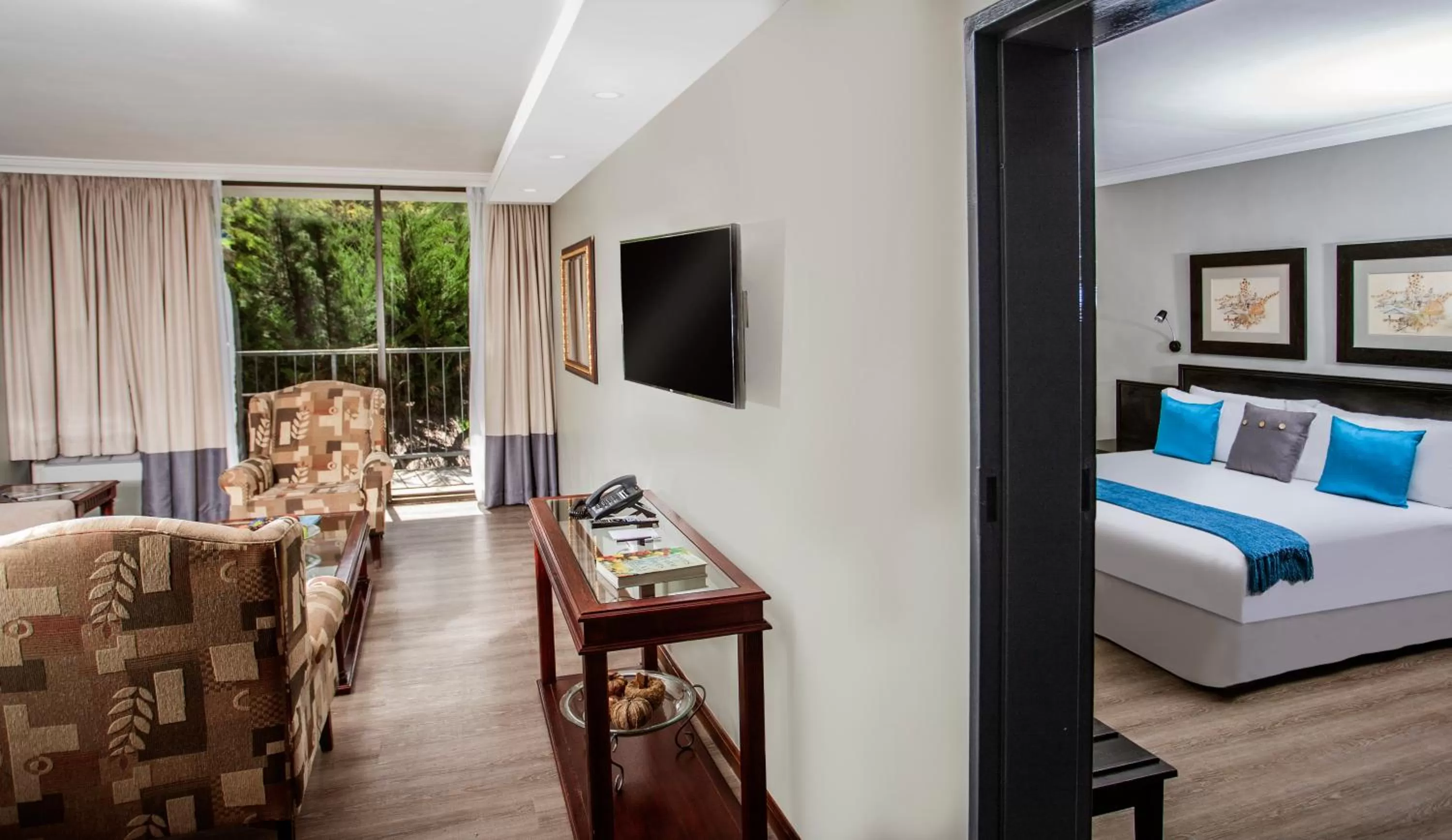 Communal lounge/ TV room, Bed in Avani Maseru Hotel