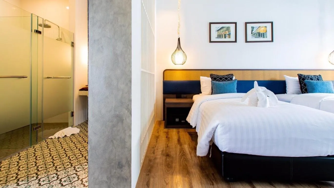 Bed in Chaanburi Boutique Resort