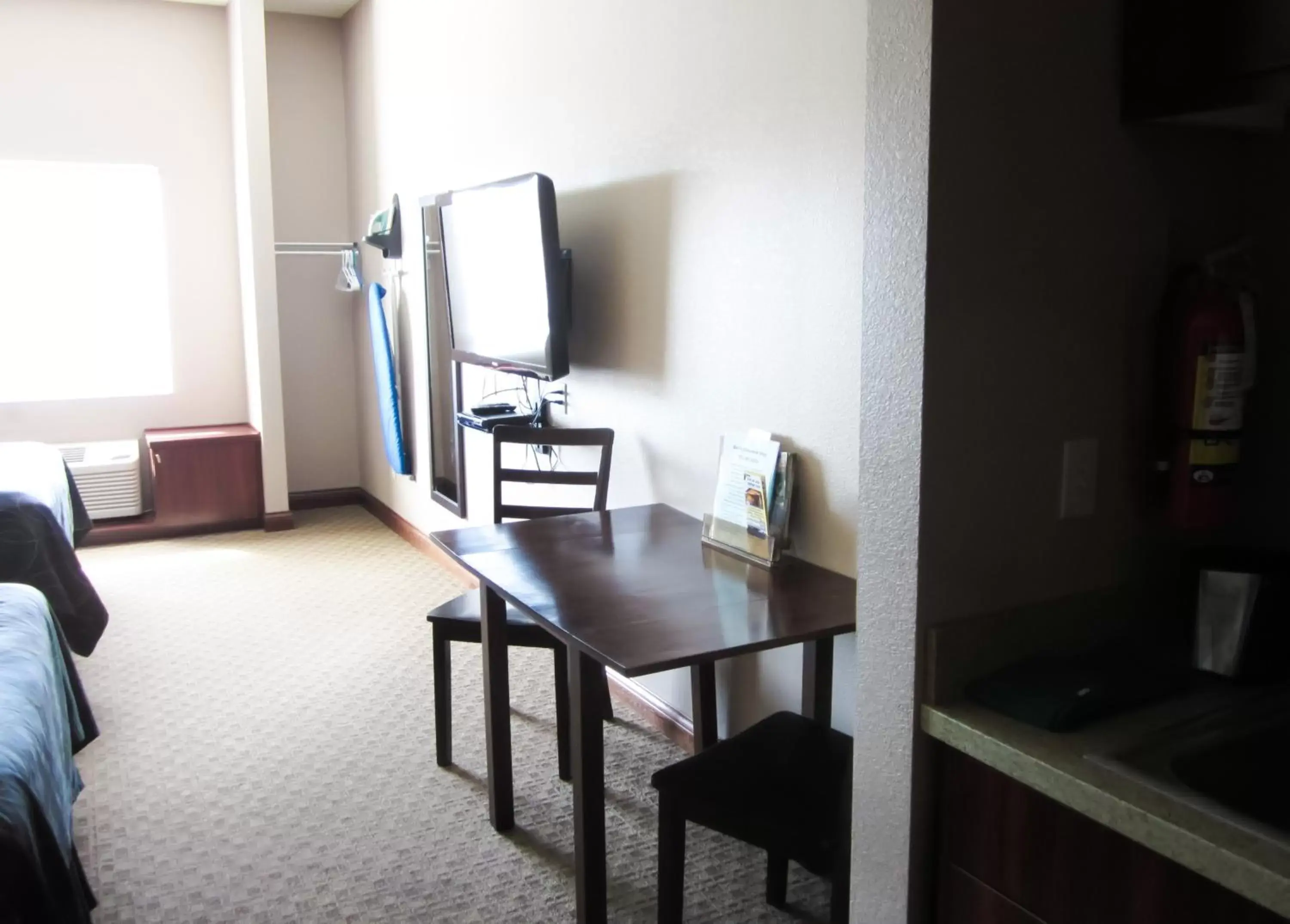 TV/Entertainment Center in Bell's Extended Stay and Suites