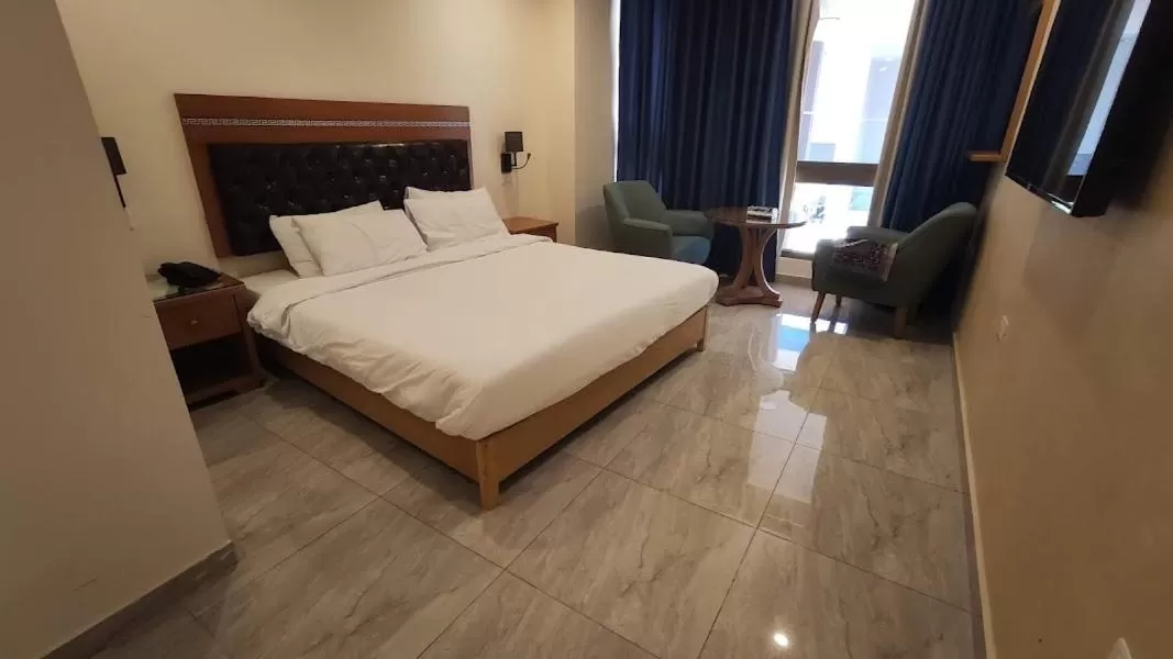 Bed in Jawharet Alswefiah Hotel Suites