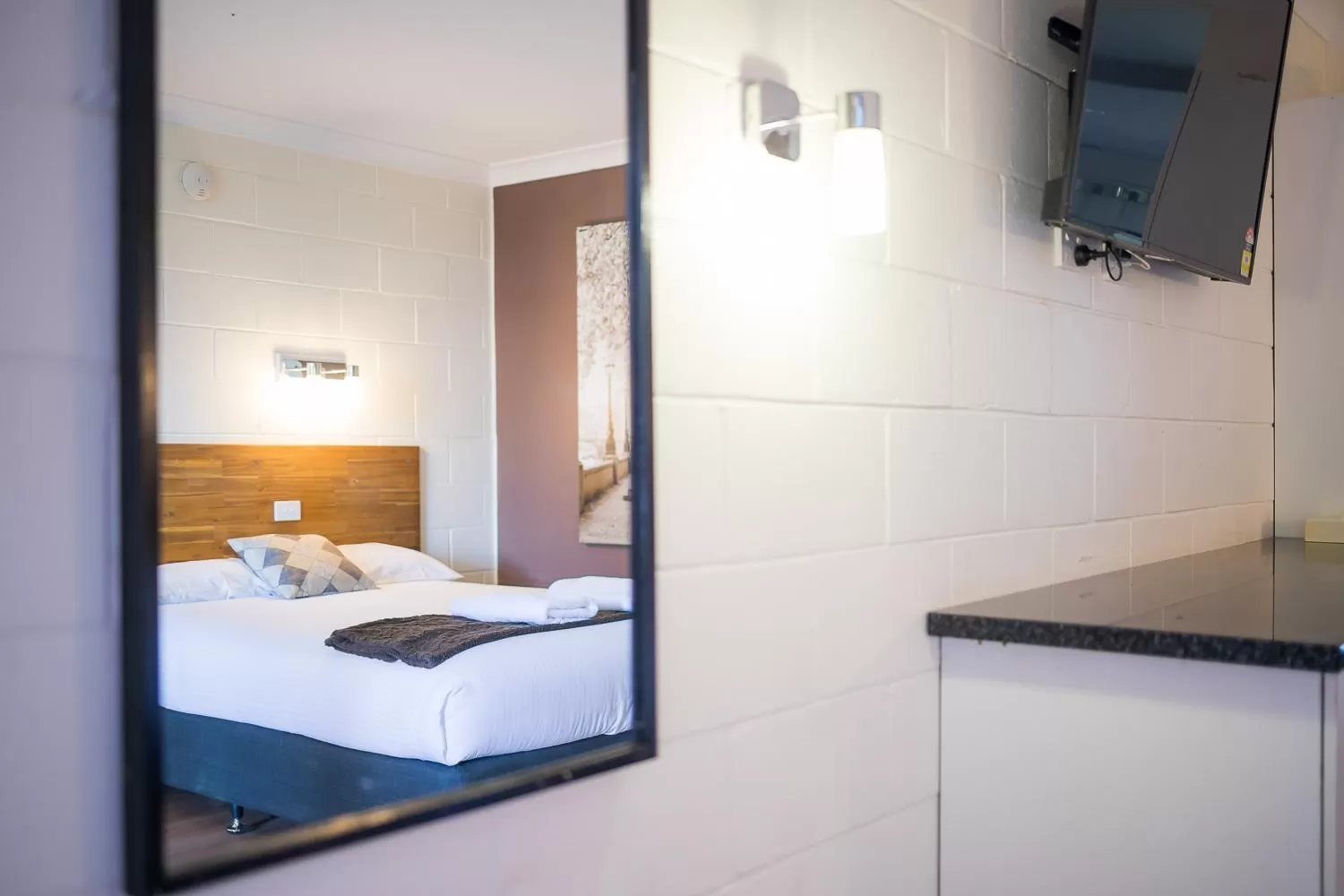 Bed in Plainsman Motel