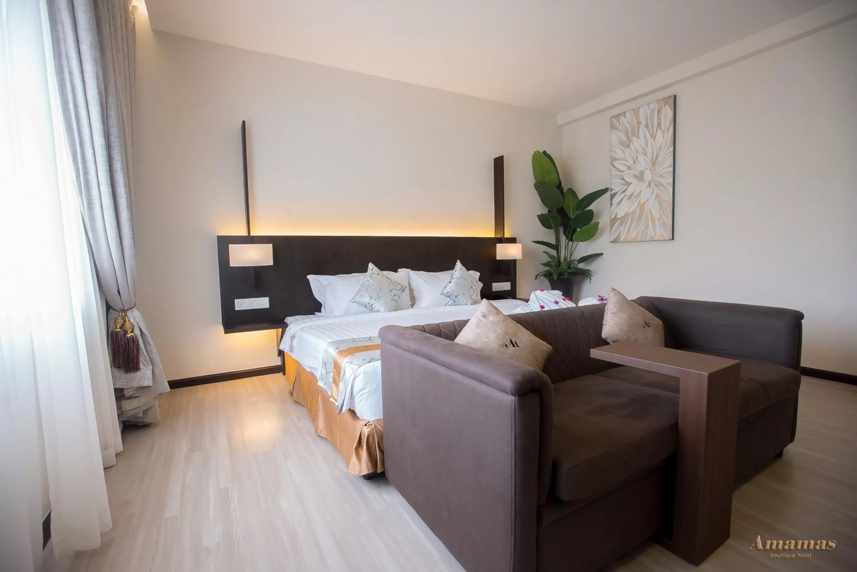 Bed in Amamas Boutique Hotel Kuching