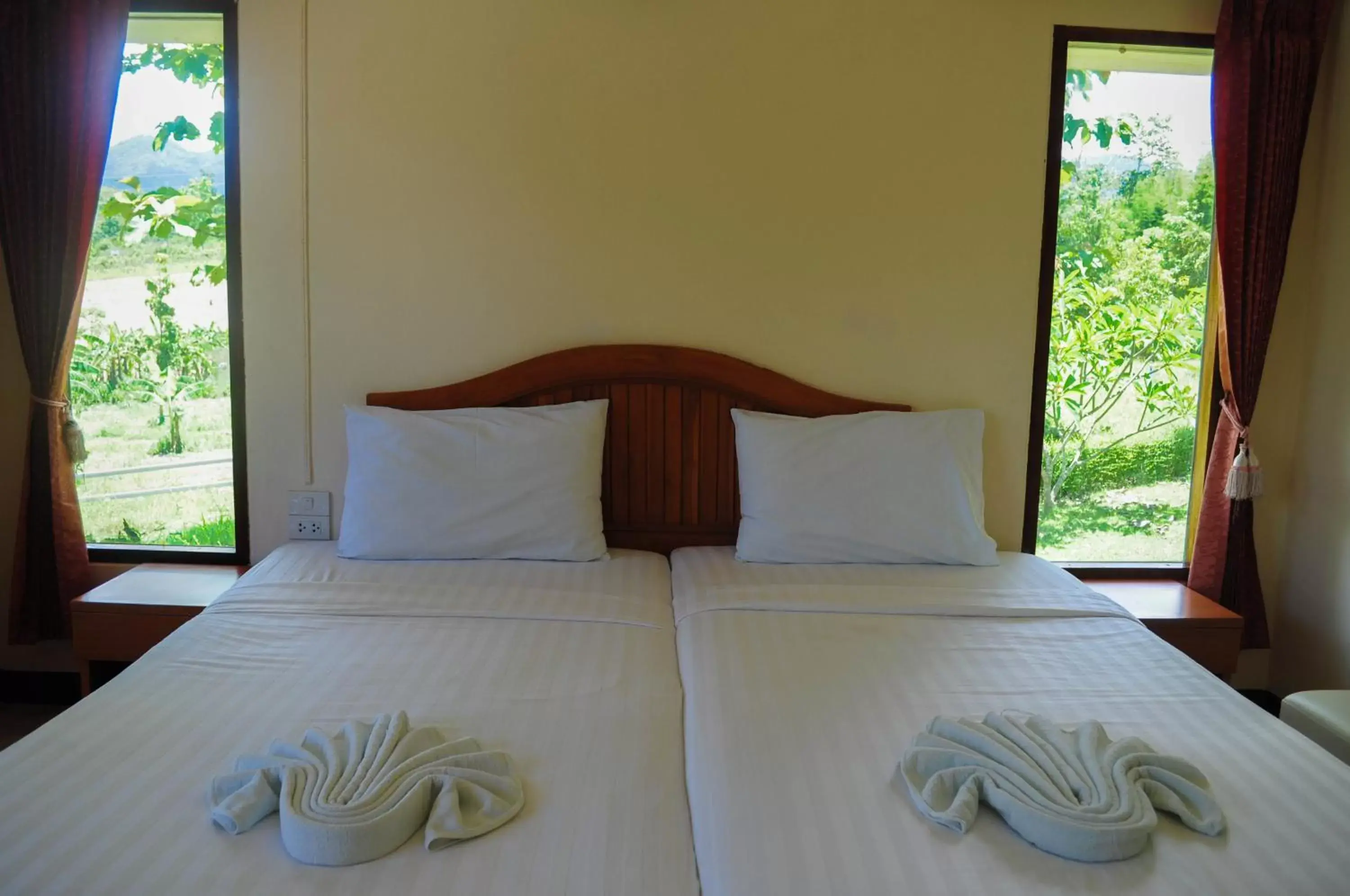 Bed in Pai Iyara Resort