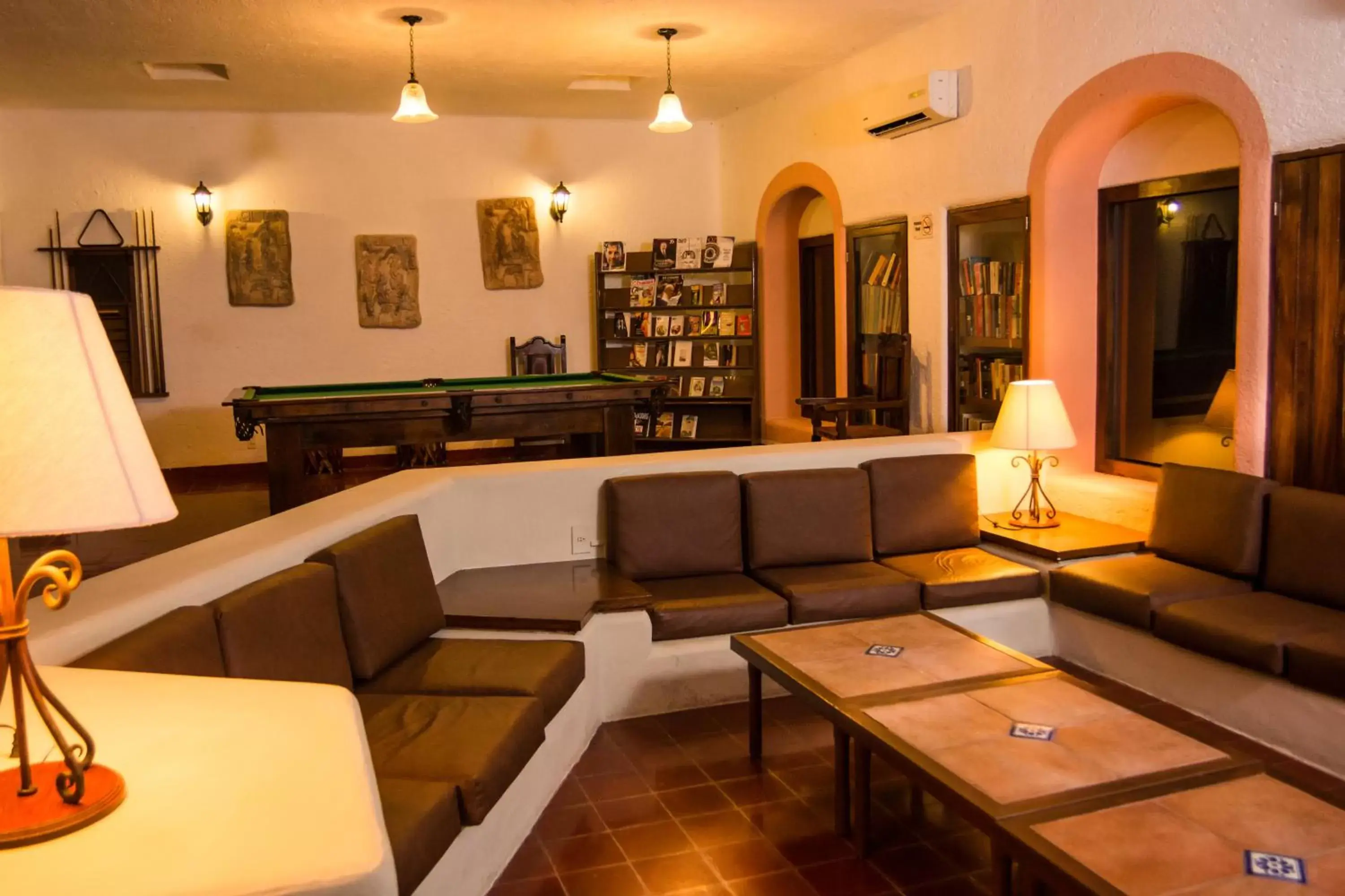Communal lounge/ TV room in Villas Arqueologicas Chichen Itza