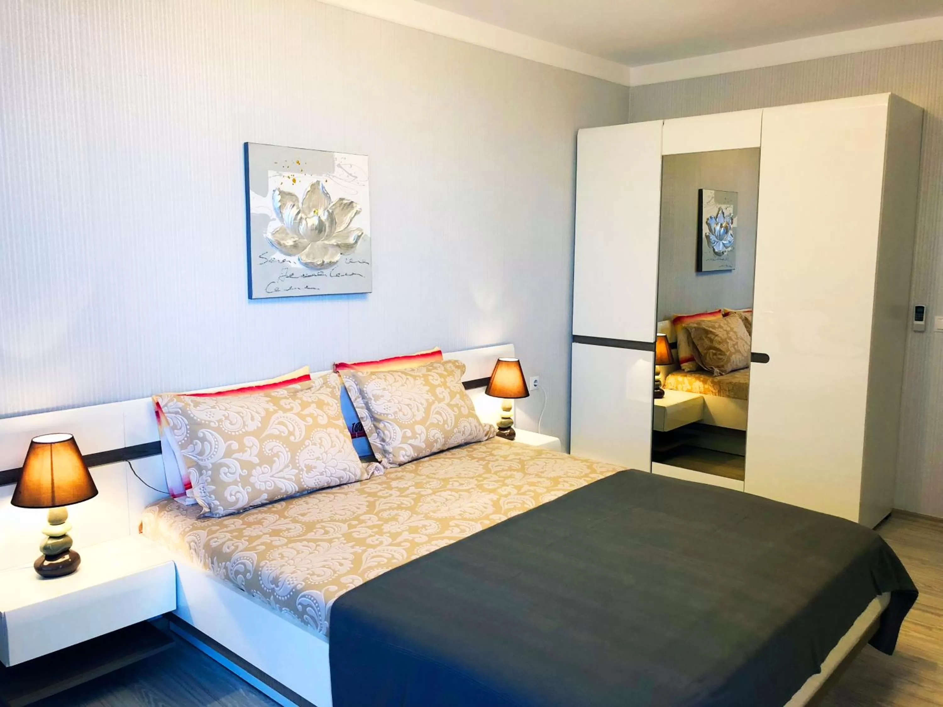 Bed in APART-HOTEL Stamopolu Lux с изглед към морето