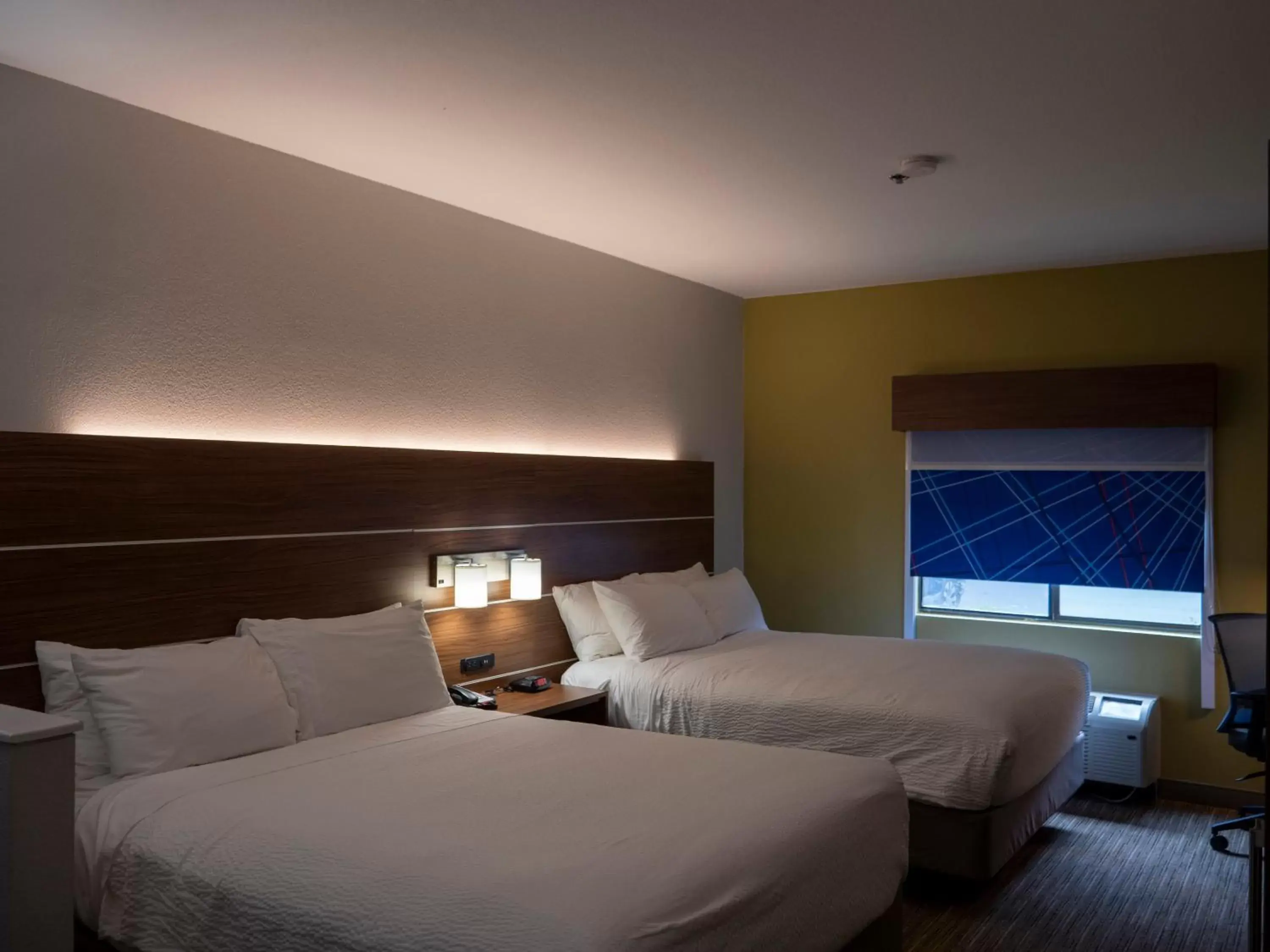 Bed in Holiday Inn Express & Suites Greenville Airport, an IHG Hotel