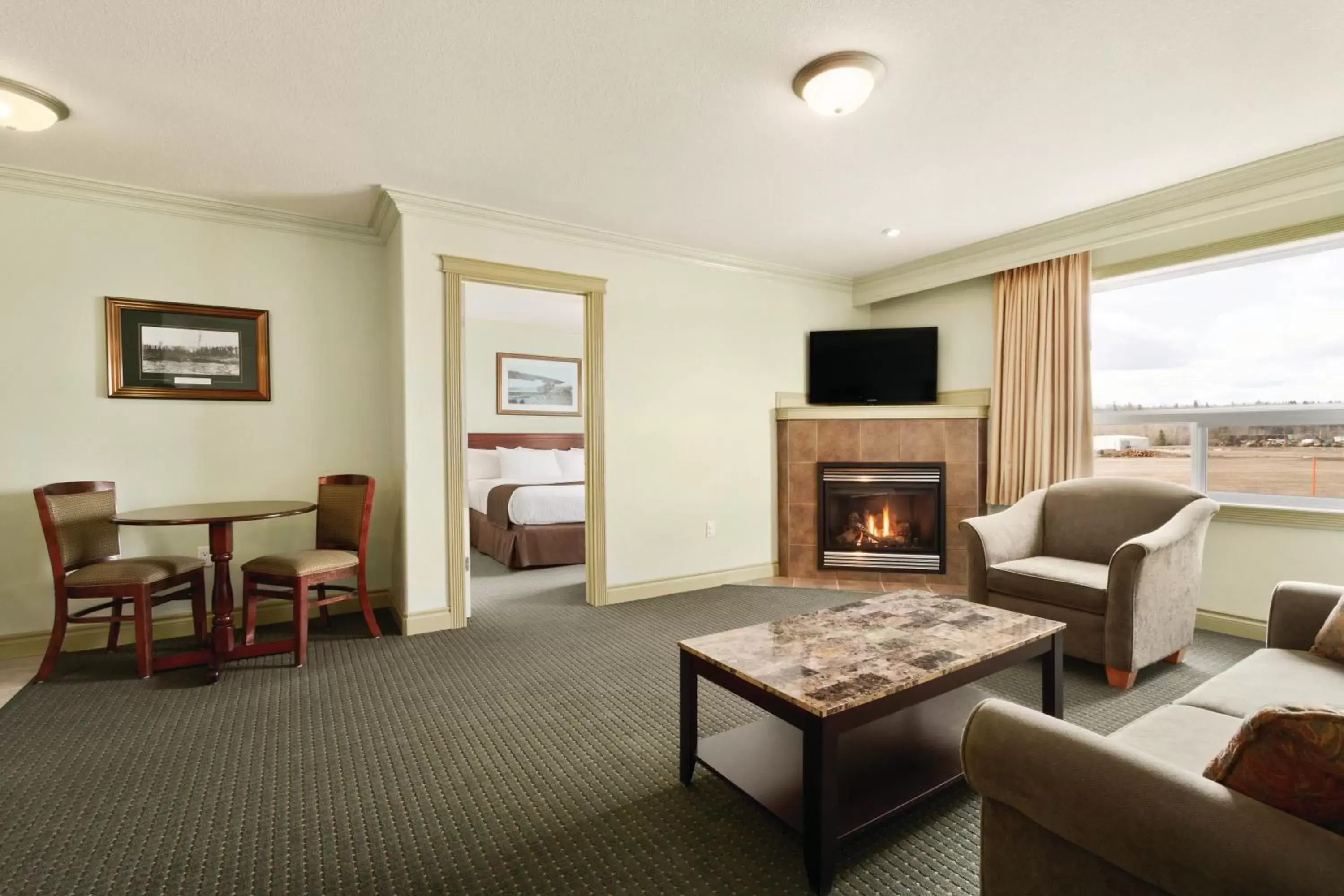 Bedroom, Seating Area in Quality Inn & Suites