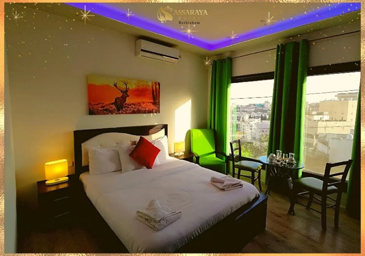 View (from property/room), Bed in Assaraya Palace Hotel