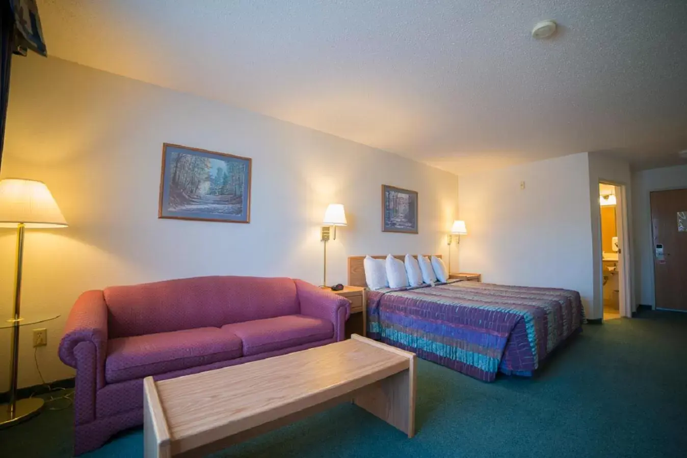Bedroom in River Valley Inn & Suites