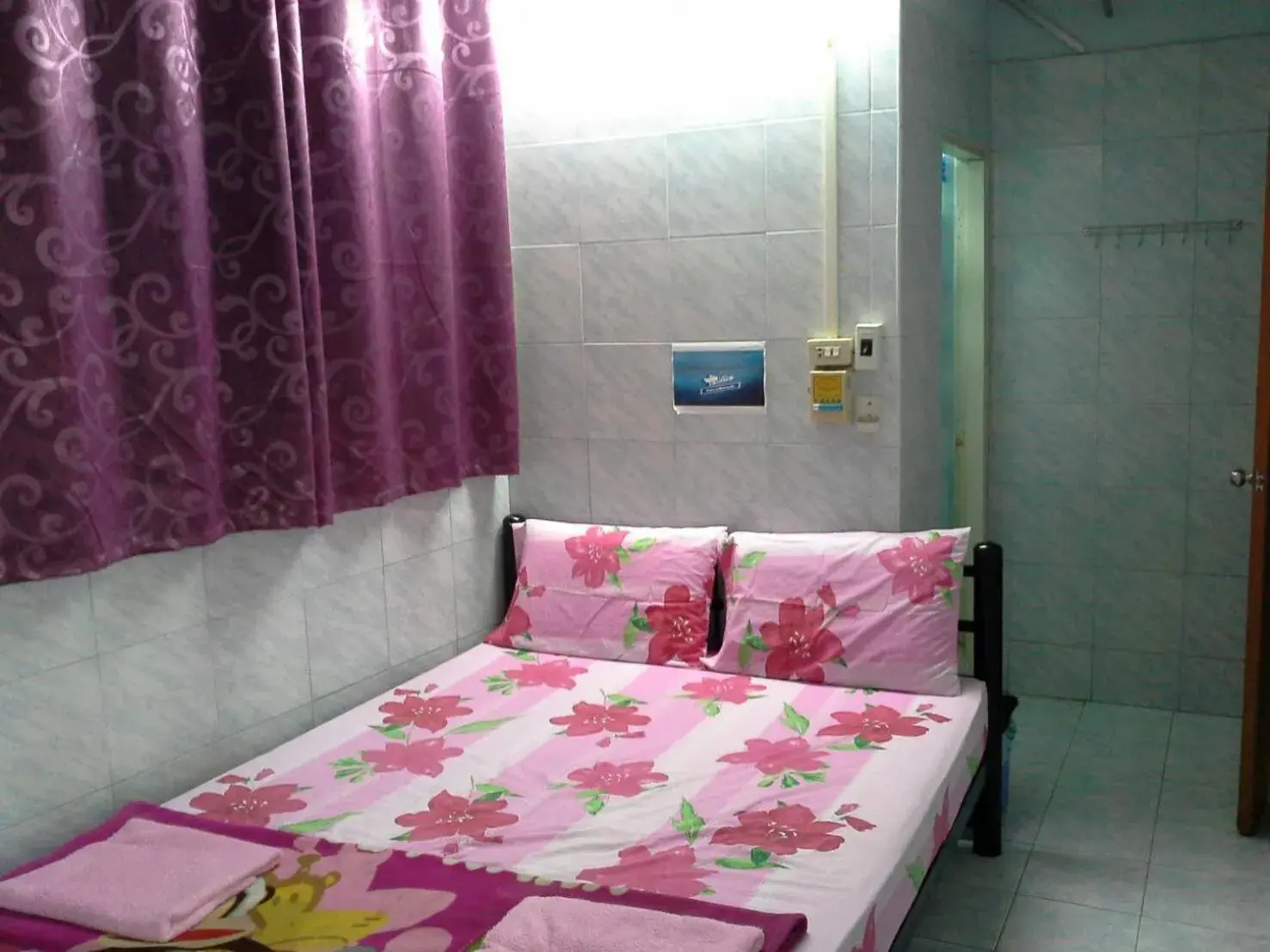 Bed in New Central Guesthouse