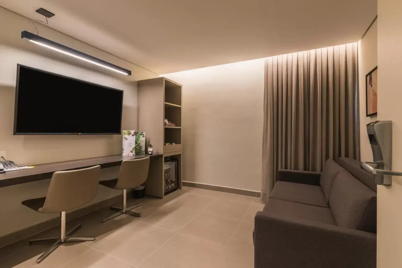 Living room, TV/Entertainment Center in Royal Jardins Boutique Hotel
