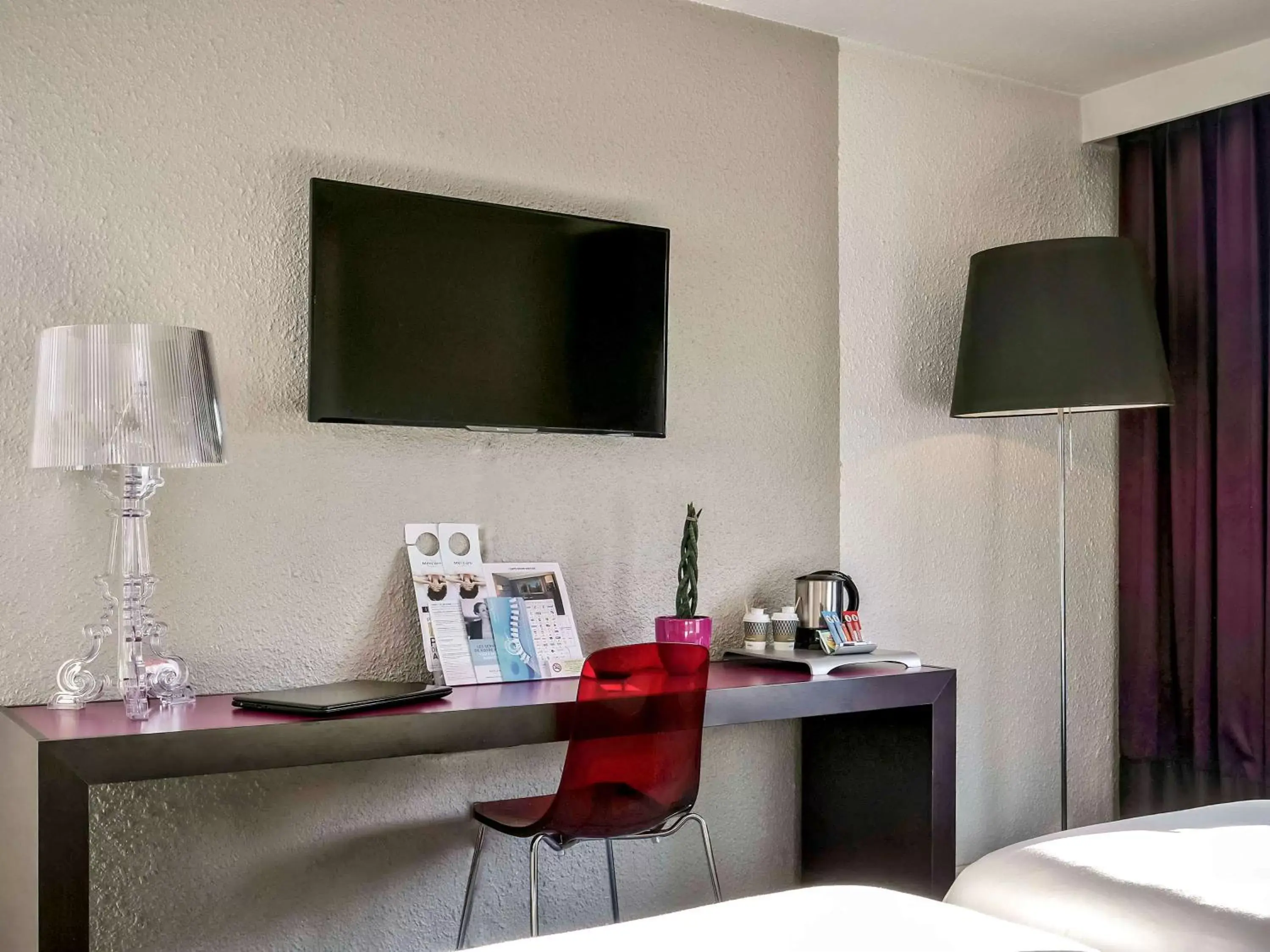 Photo of the whole room, TV/Entertainment Center in Mercure Annemasse Porte De Genève