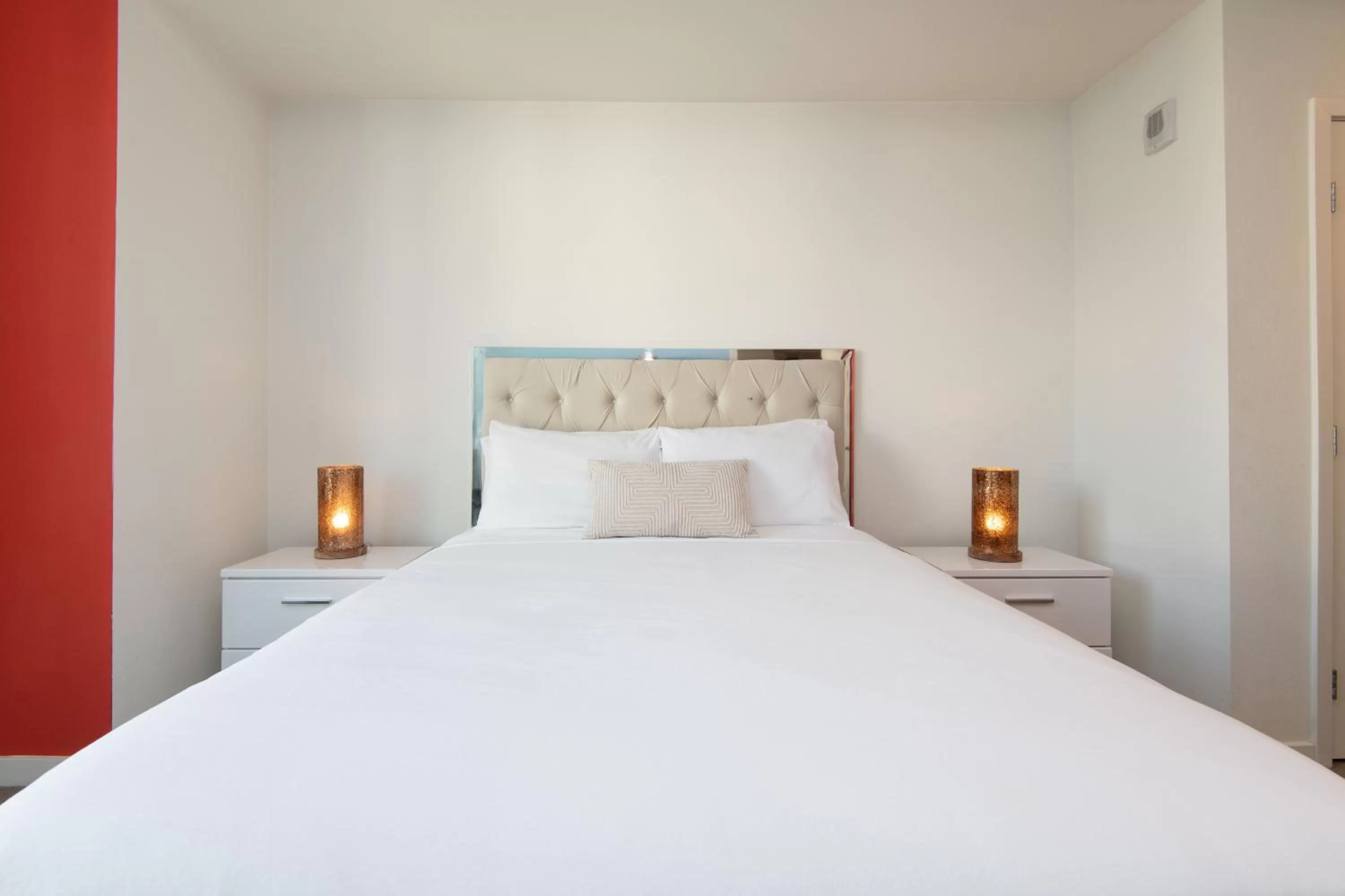 Bed in Modern Apartment Rentals