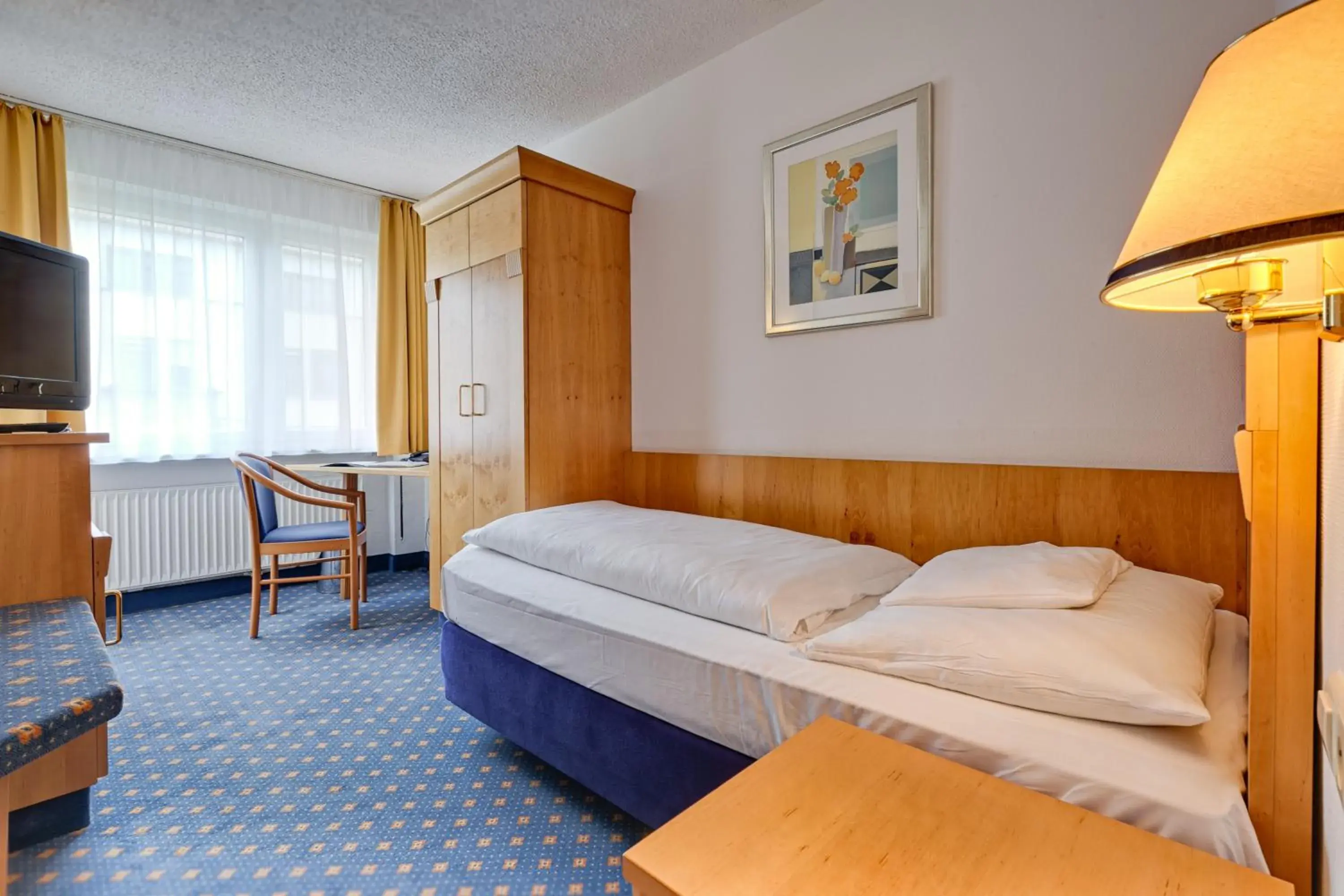 Bed in Hotel am Feuersee