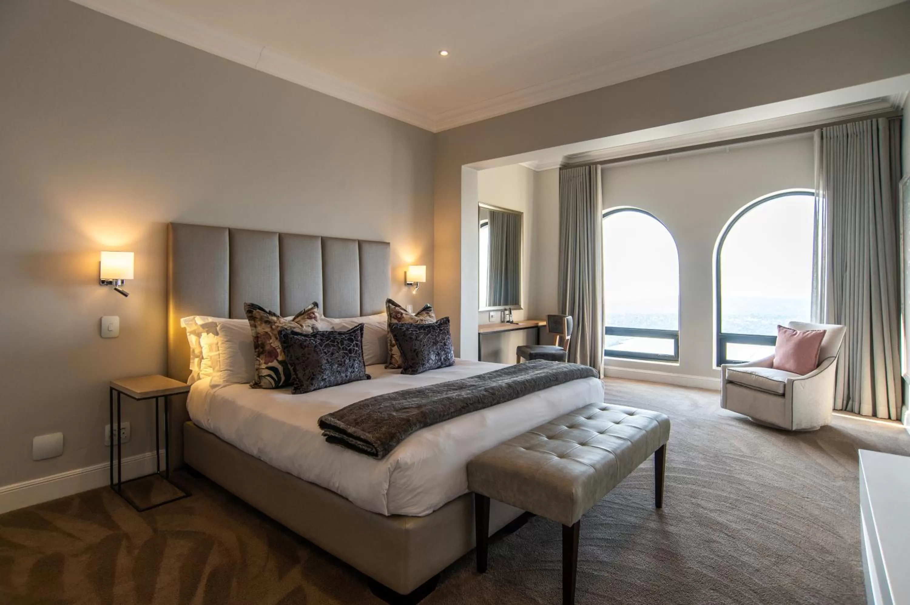 Bed in The Northcliff Boutique Hotel