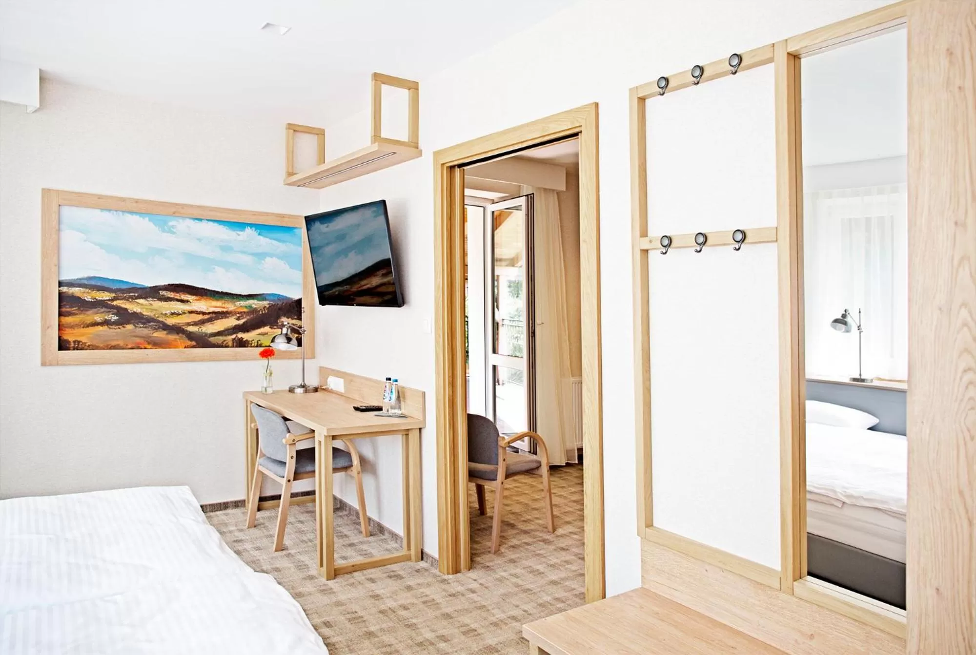 Communal lounge/ TV room, Bed in Dom Wczasowy Beskidy