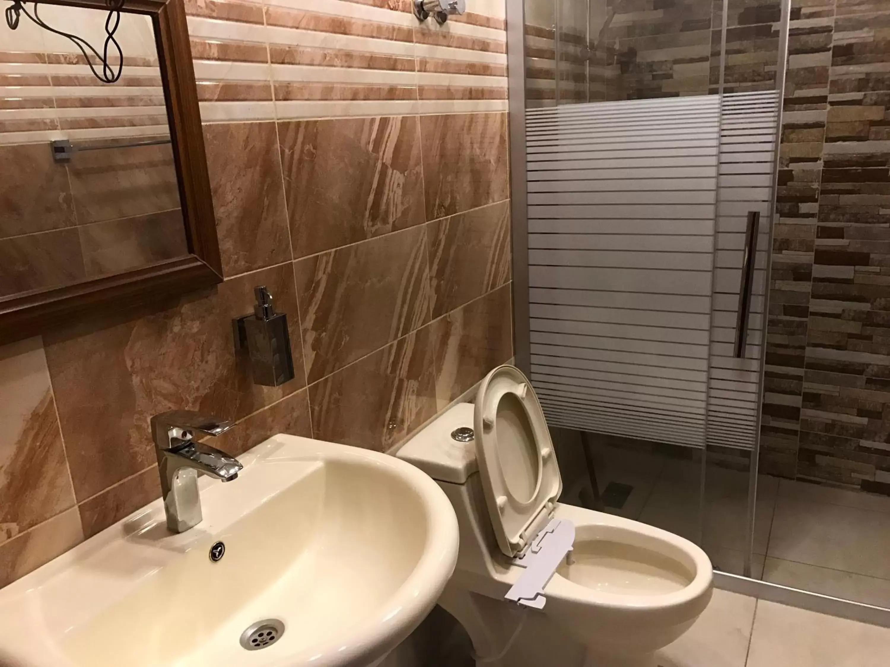 Bathroom in Sun Rise Hotel & Hostel & Tours