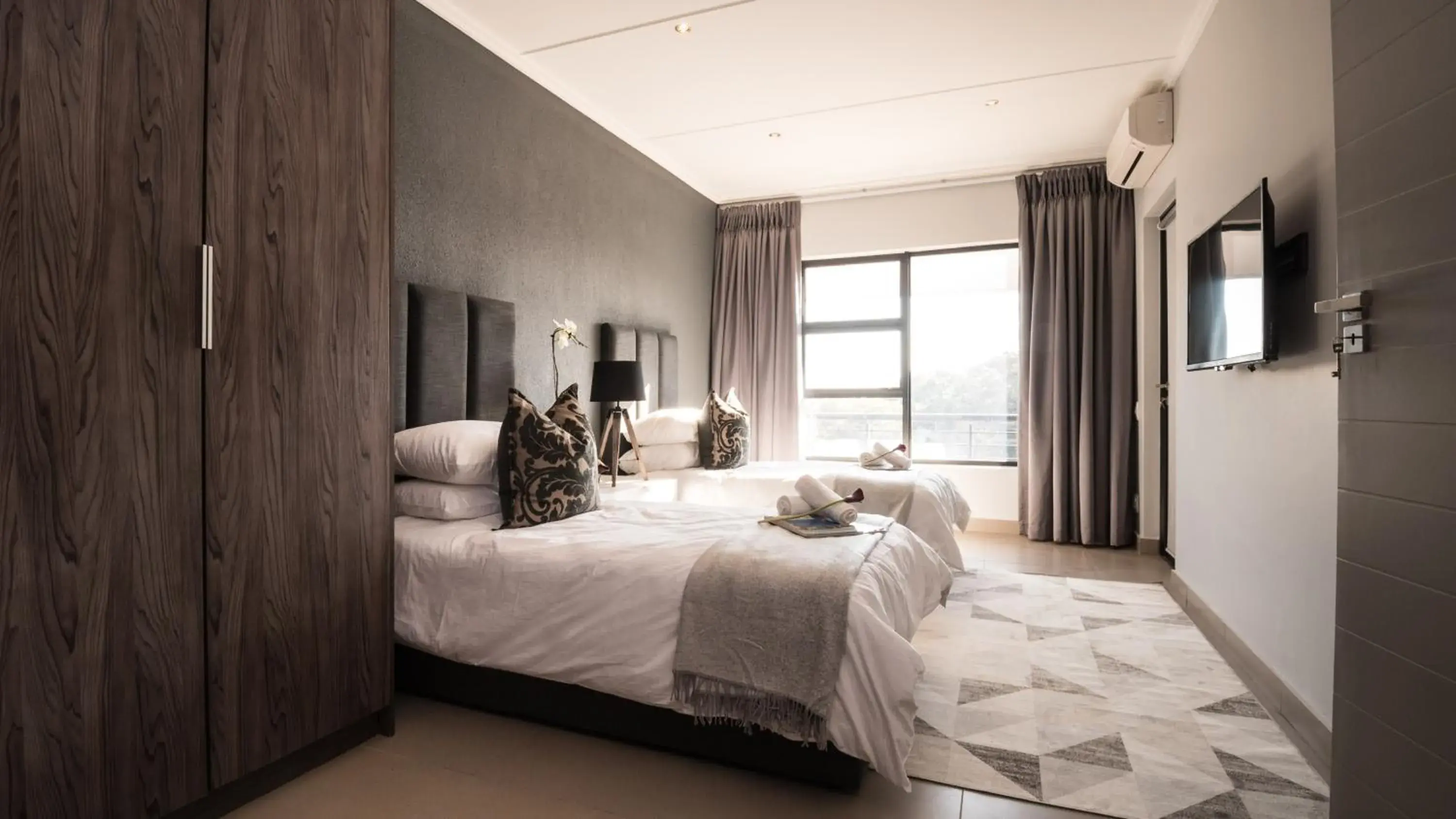 Bedroom in Odyssey Luxury Apartments