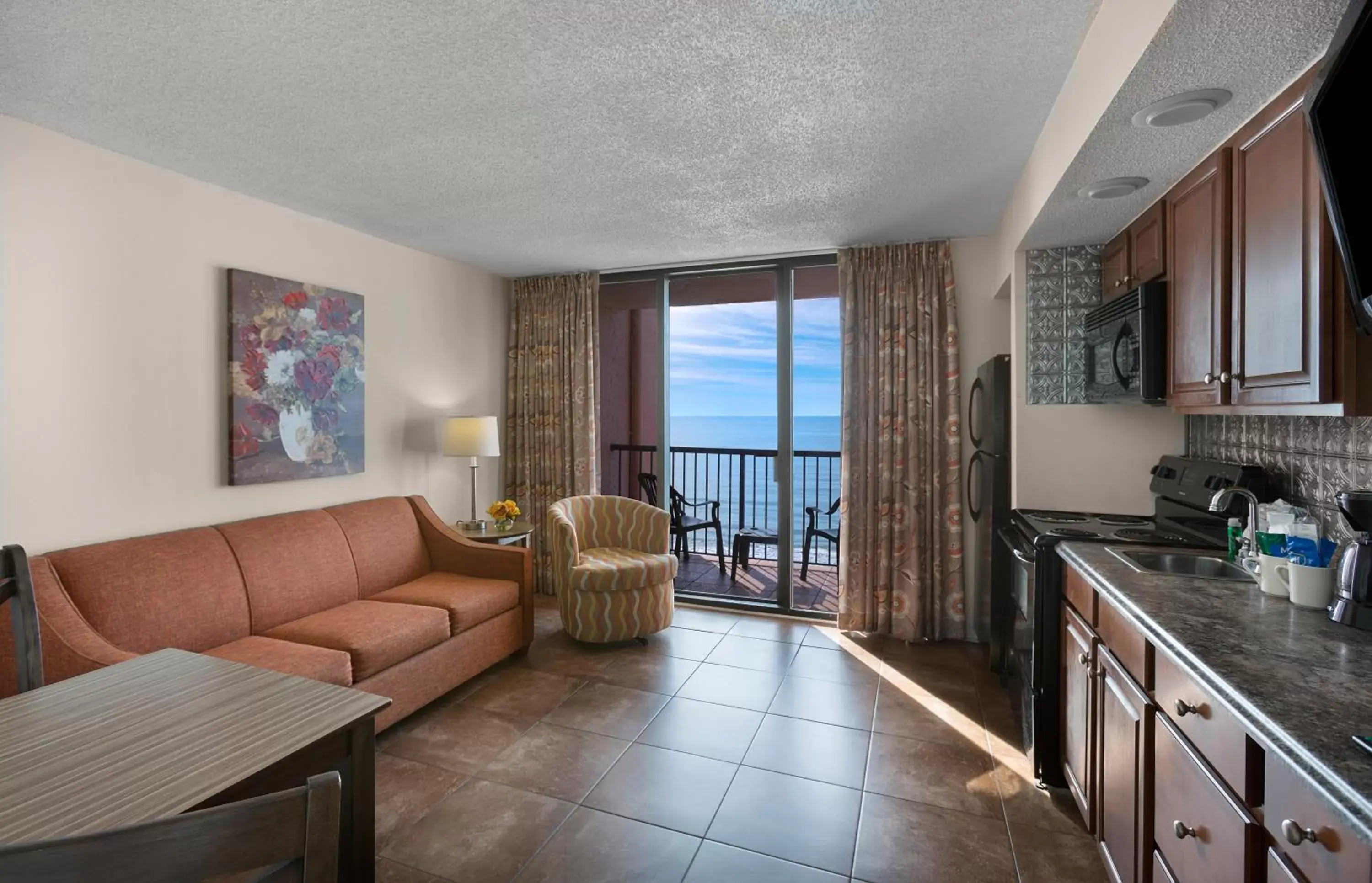 Living room in Beach Colony Resort