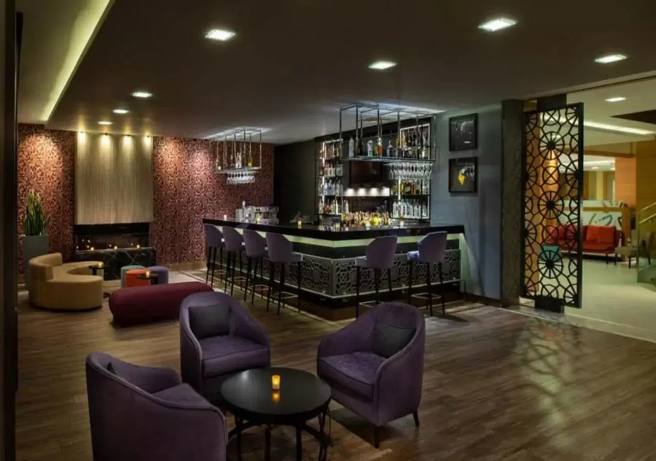 Living room, Lounge/Bar in Dosso Dossi Hotels Golden Horn