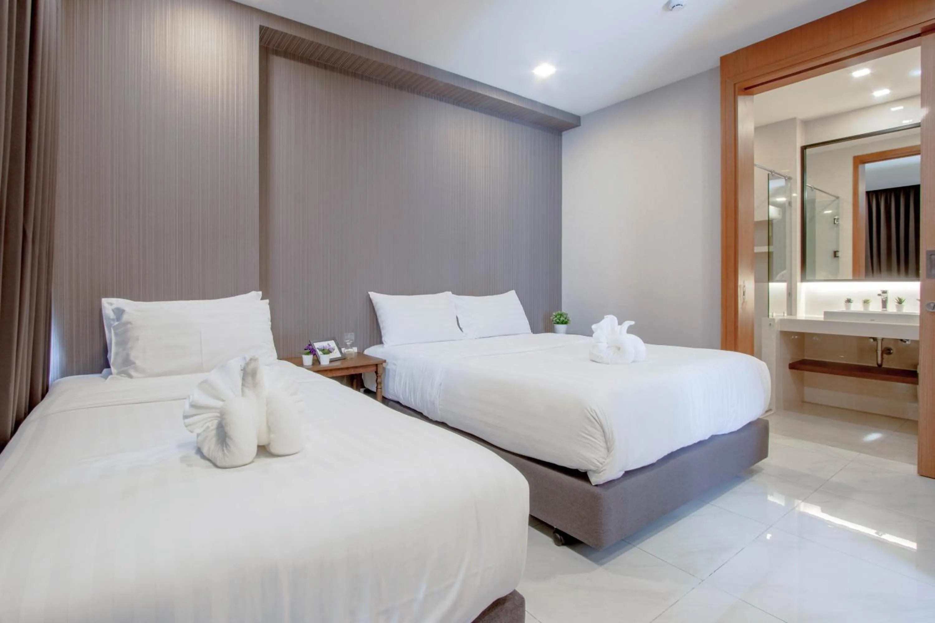 Bed in Kepler Residence Bangkok