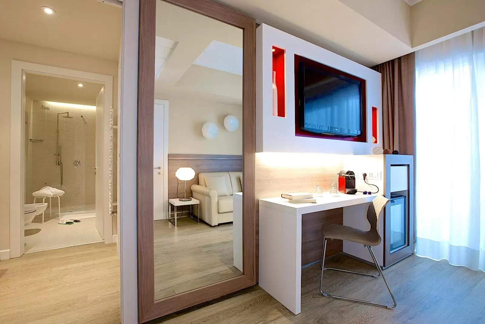 TV and multimedia, Bathroom in Enjoy Garda Hotel