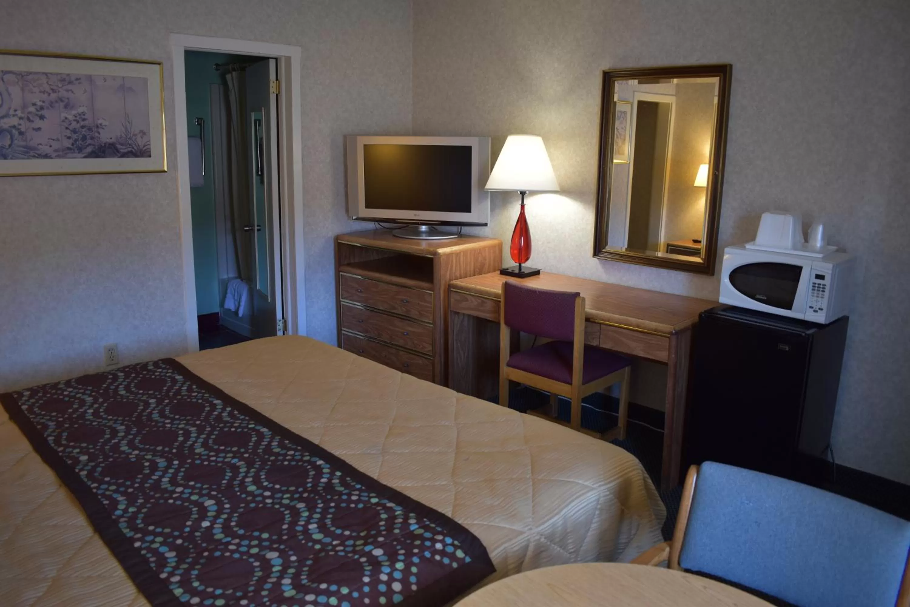 Bed in POCONO NIGHT LODGE