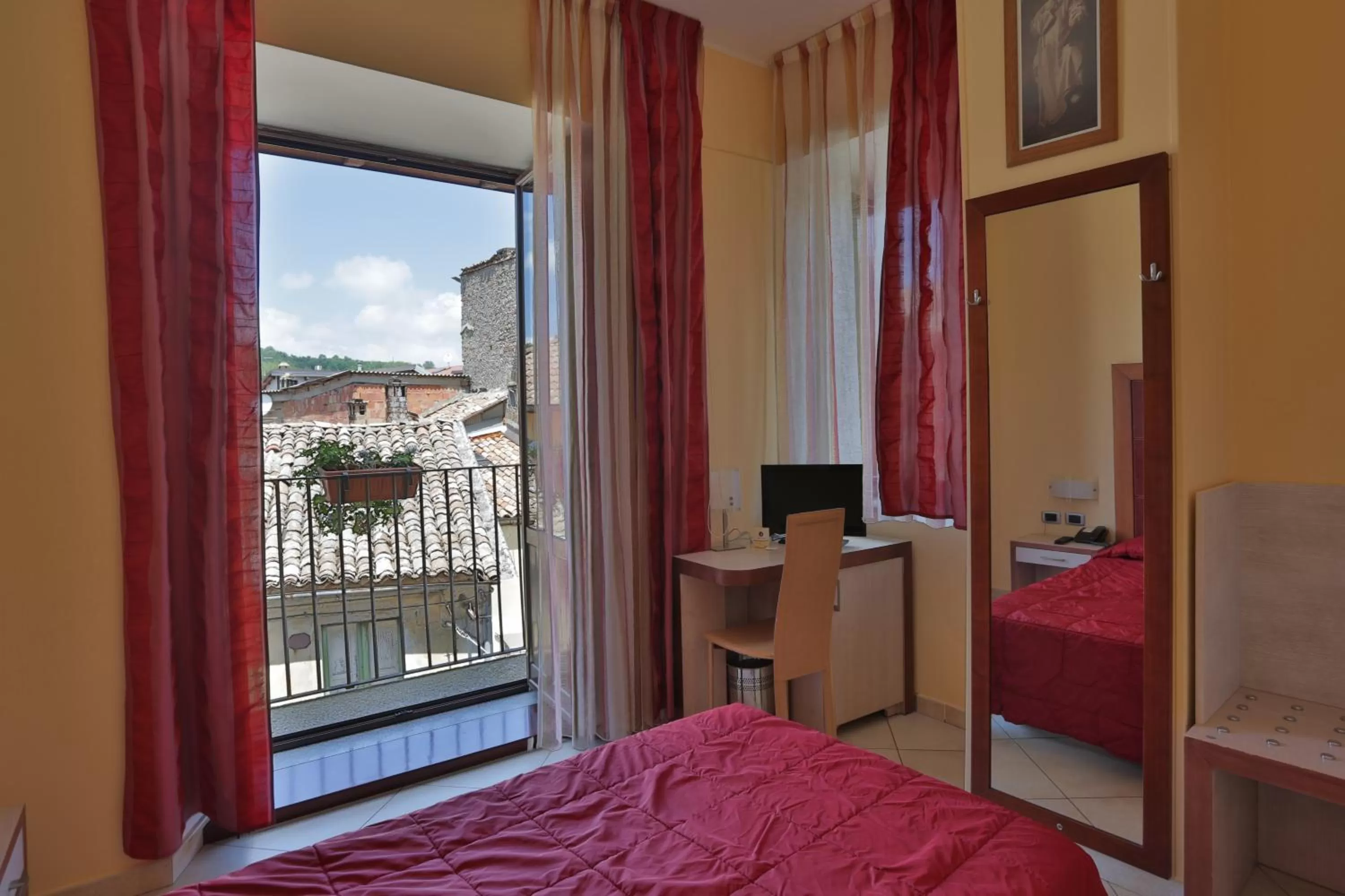 Bed in Hotel Conte Ruggero