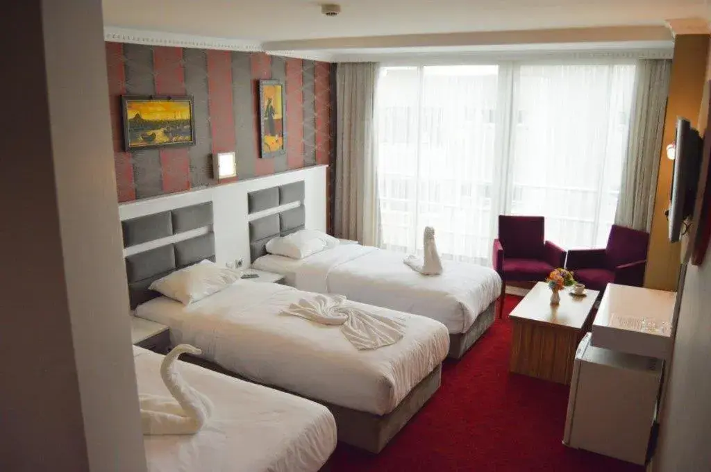Bed in Comfort Life Hotel