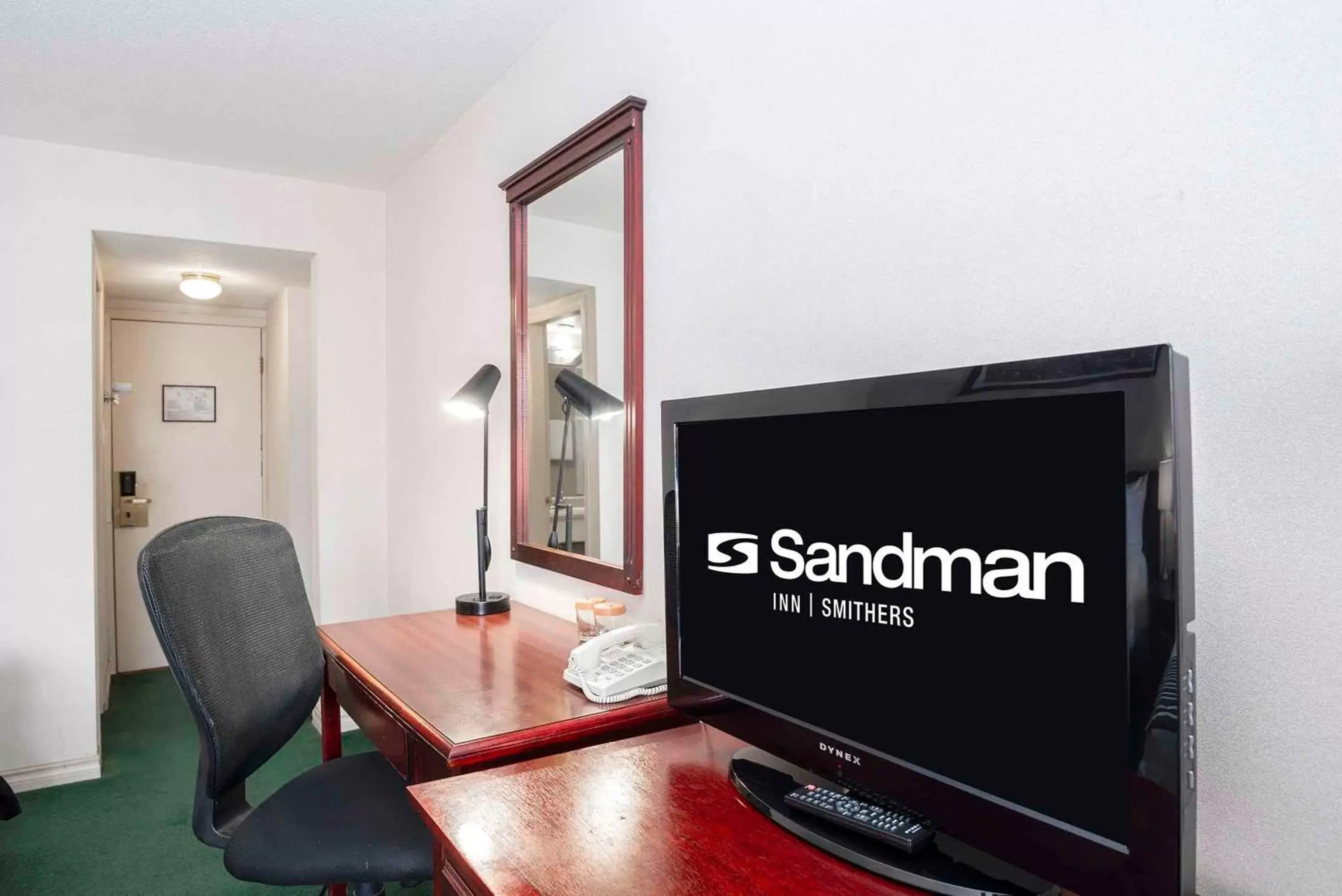 Photo of the whole room, TV/Entertainment Center in Sandman Inn Smithers