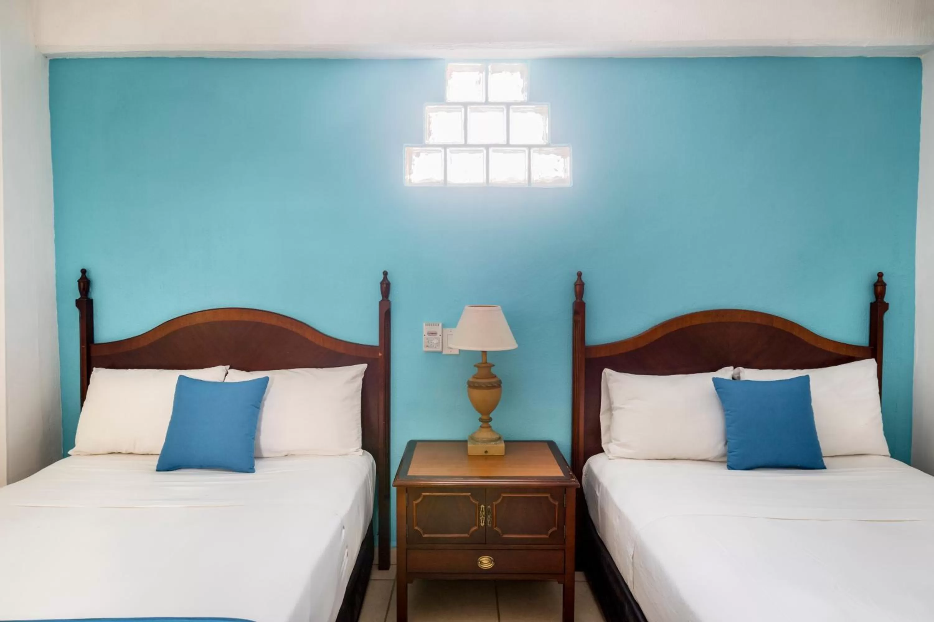 Bed in Hotel Pueblito Vallarta