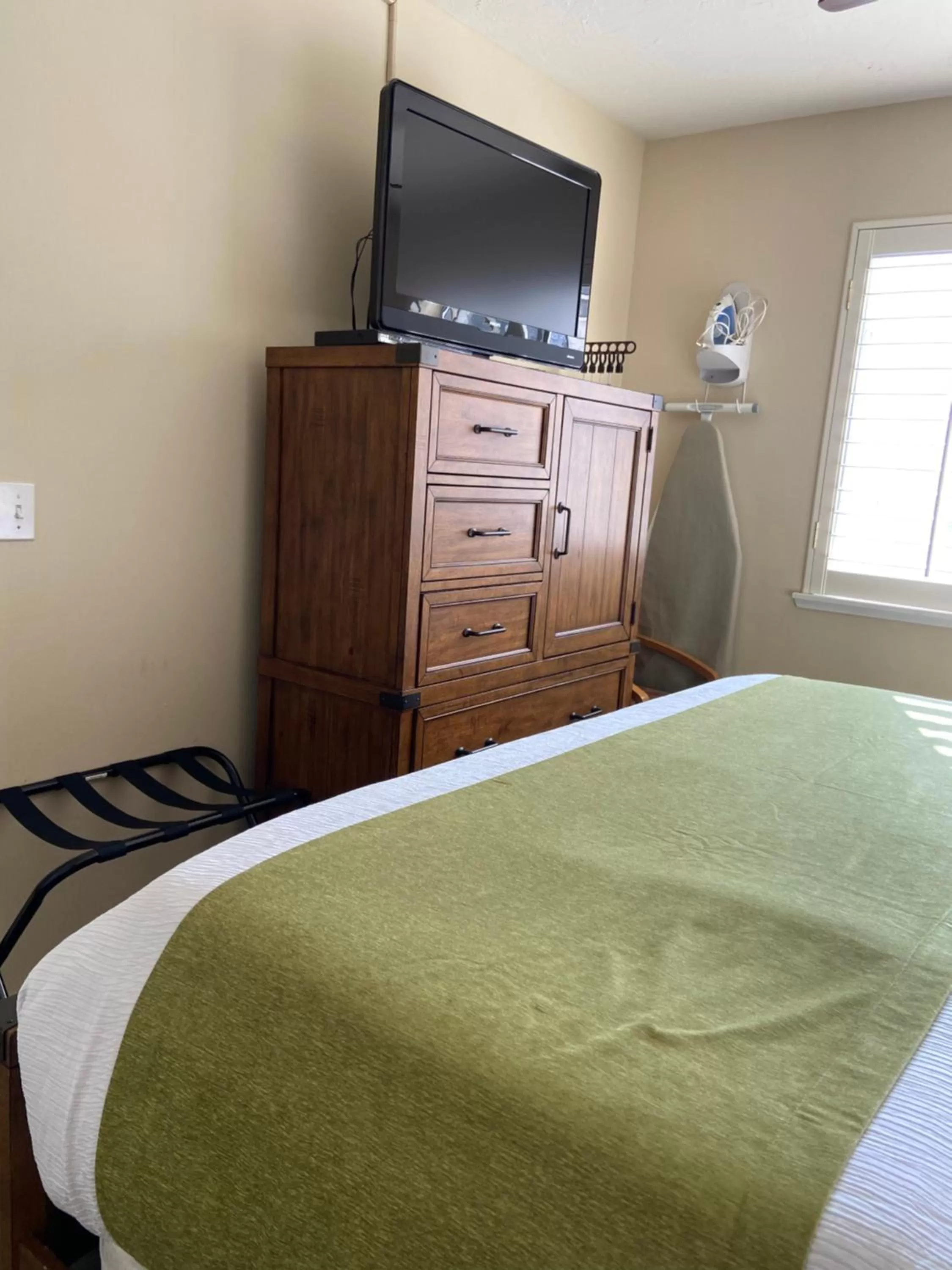 Bed in GetAways at Park Regency Resort