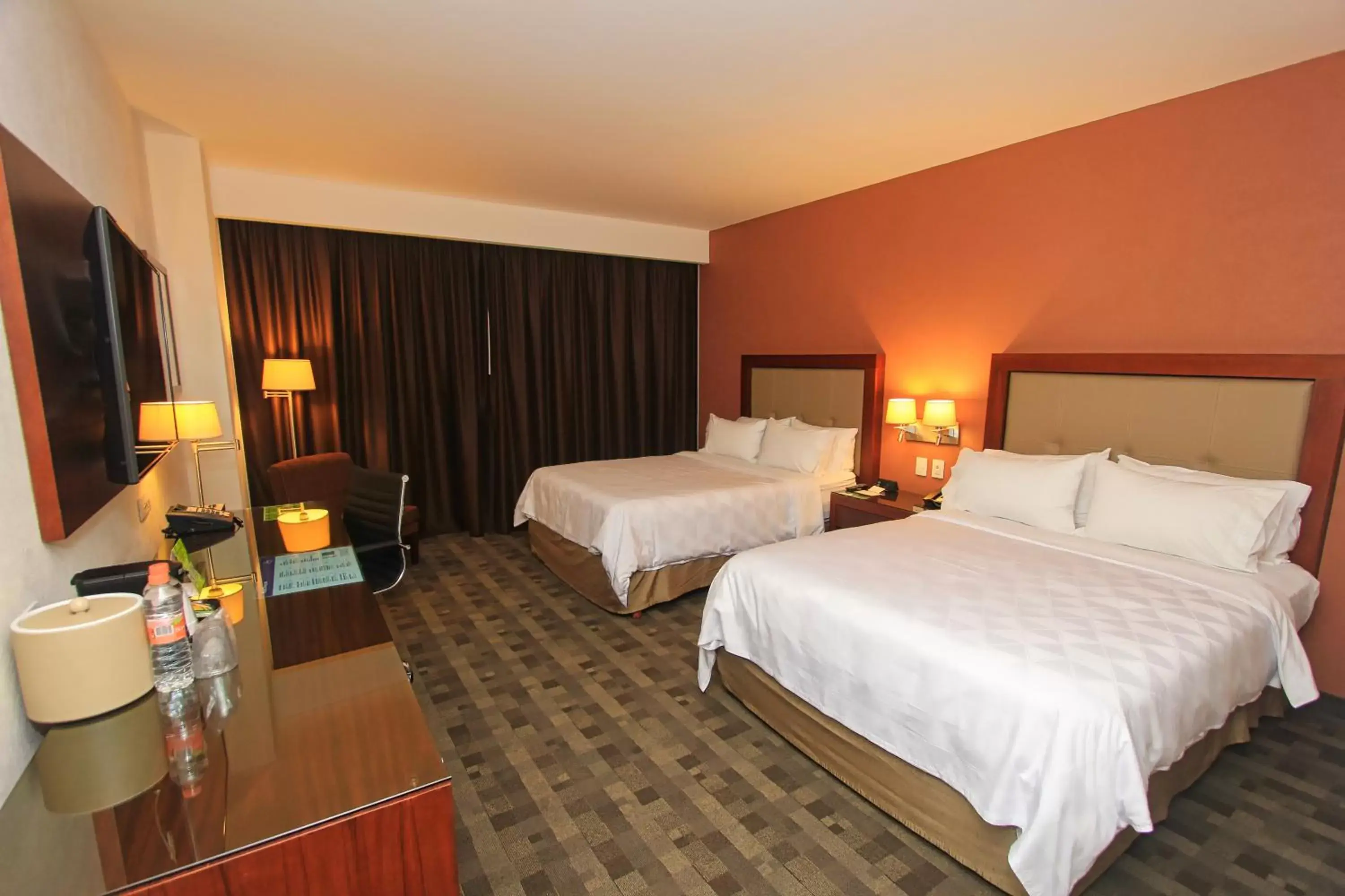 Bed in Holiday Inn & Suites Plaza Mayor, an IHG Hotel