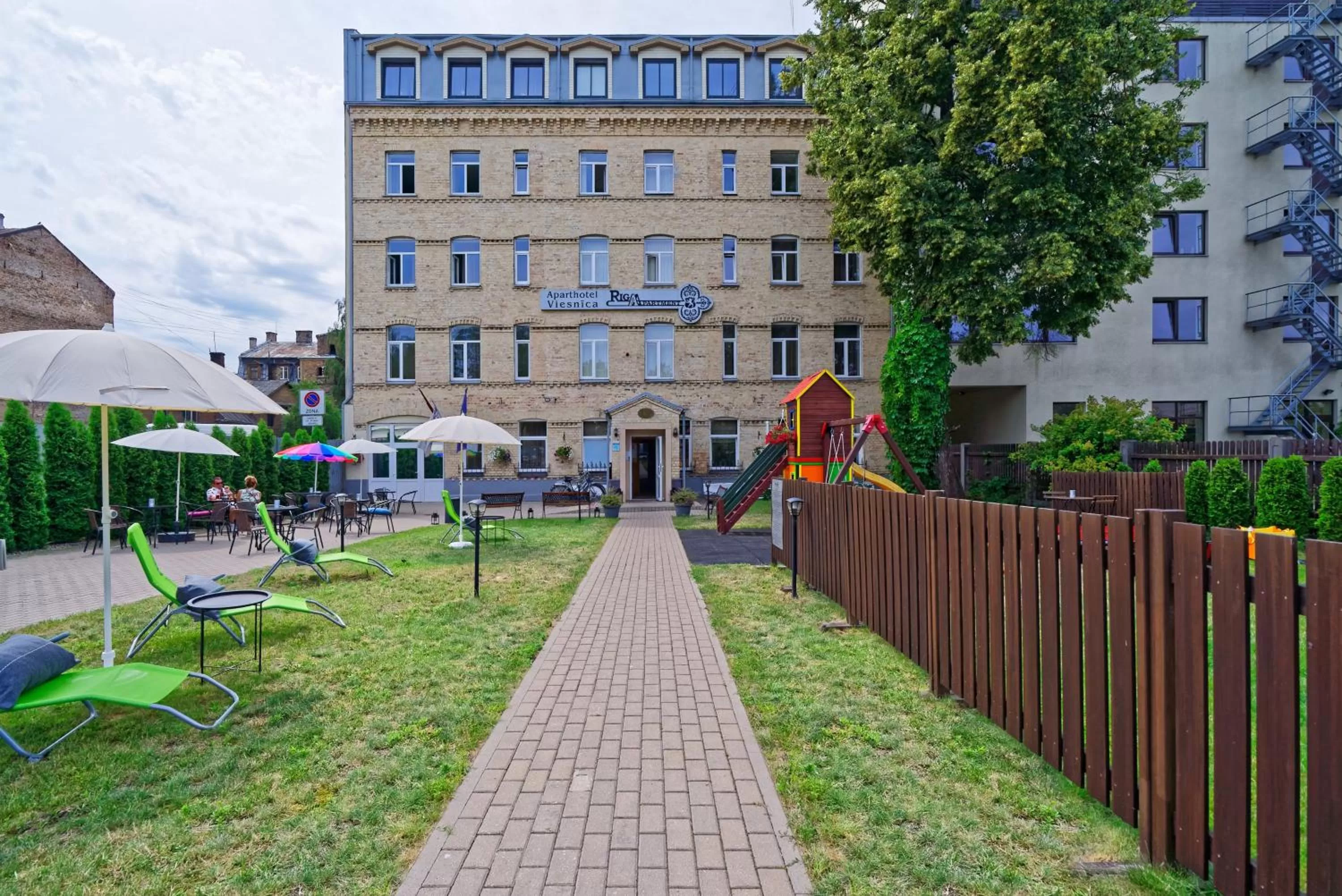 Property building in RIGAAPARTMENT SONADA Family Aparthotel - Private Parking