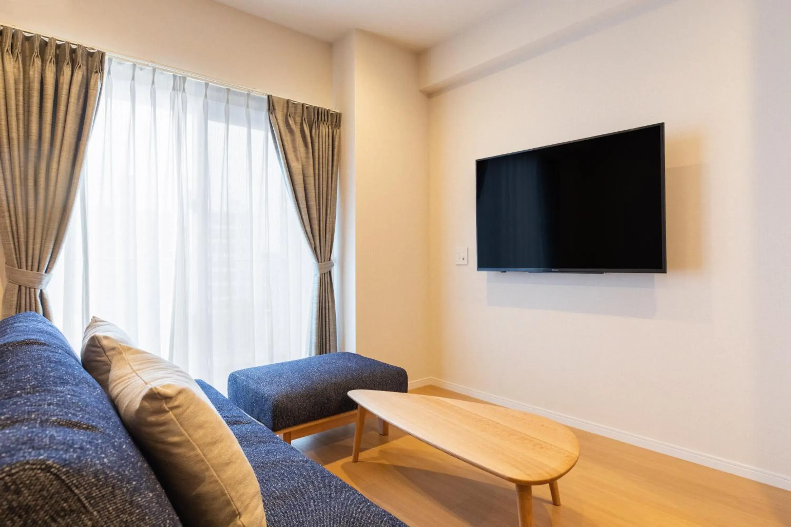 Living room, TV/Entertainment Center in LAPIN MIHAMA Residence Hotel