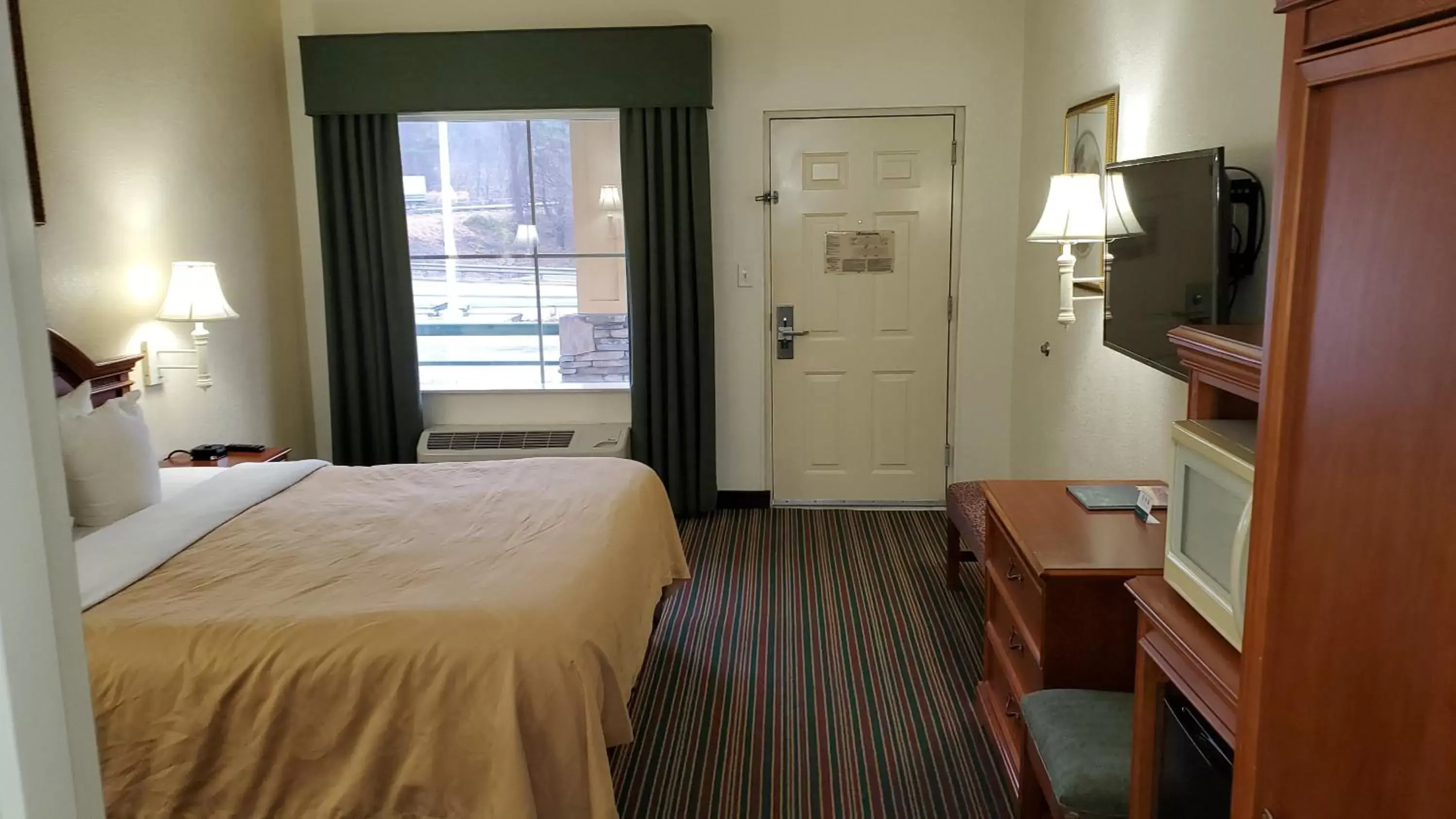 Bedroom in Quality Inn & Suites Biltmore East Bedroom in Quality Inn & Suites Biltmore East