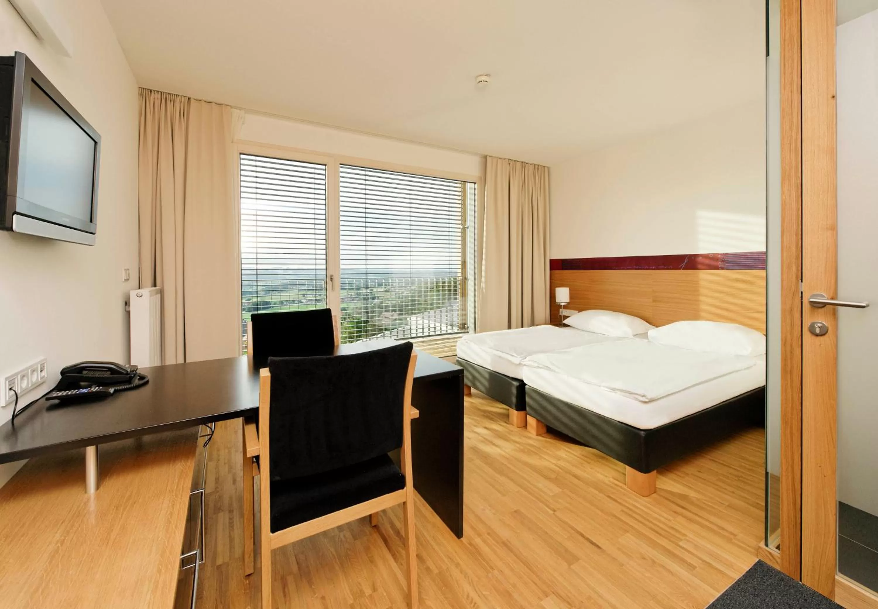 Photo of the whole room, Bed in SPES Hotel & Seminare