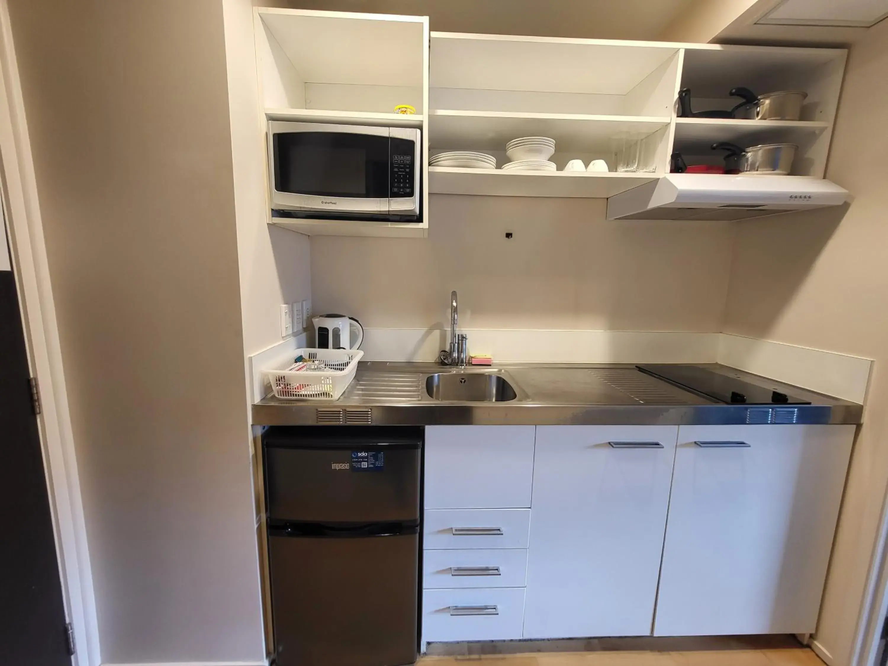 Kitchen/Kitchenette in Empire Apartments