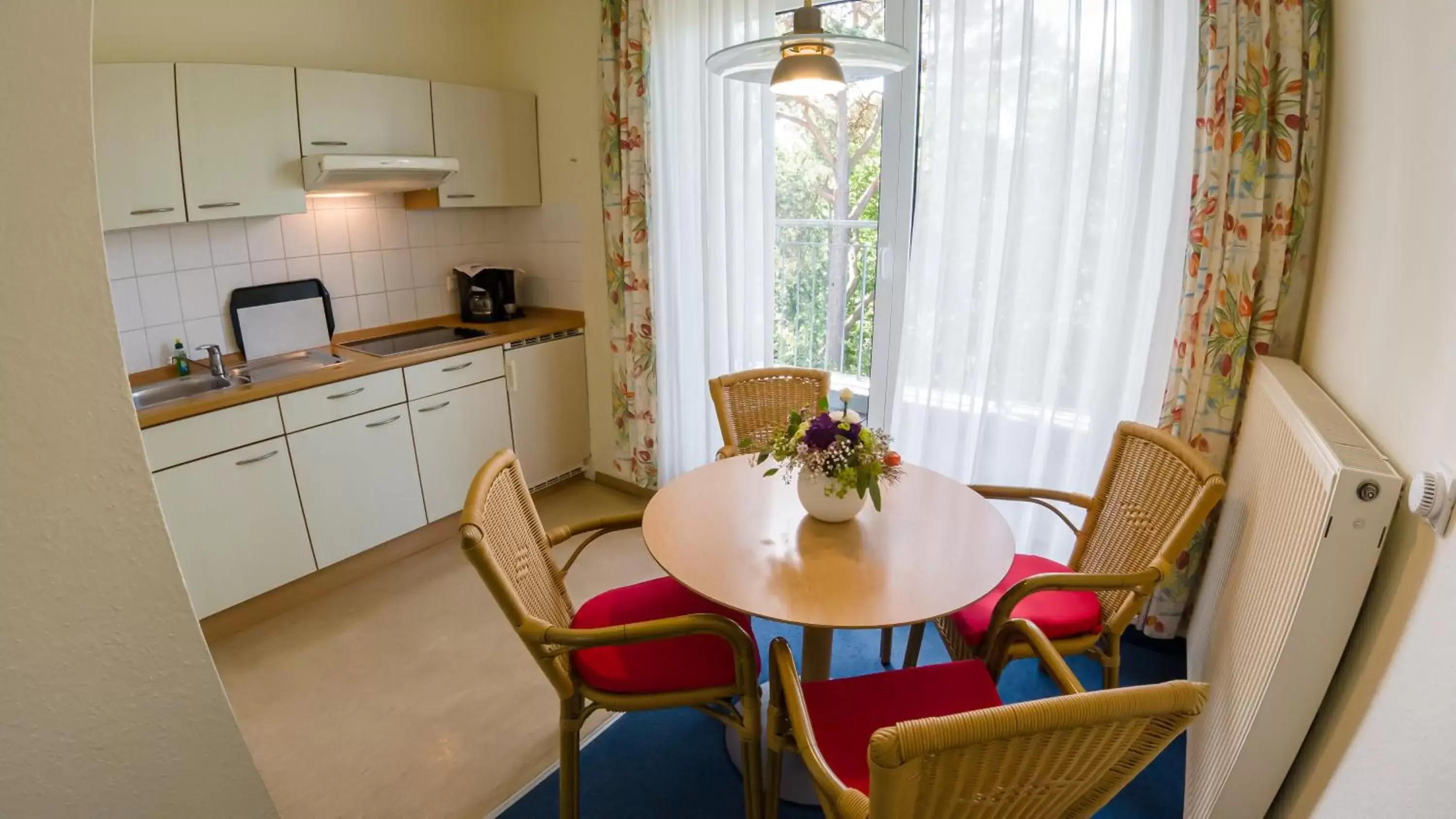 Kitchen or kitchenette, Dining Area in IFA Rügen Hotel & Ferienpark