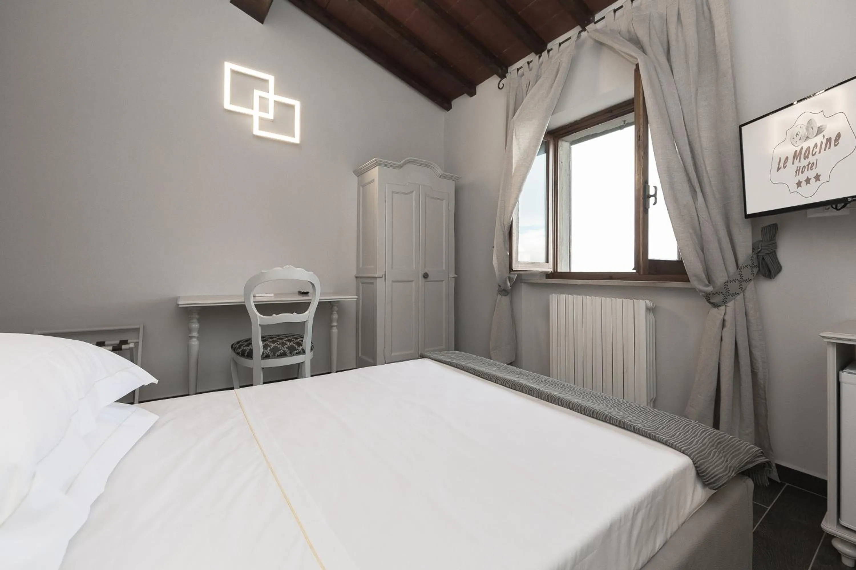 Bed in Hotel Le Macine