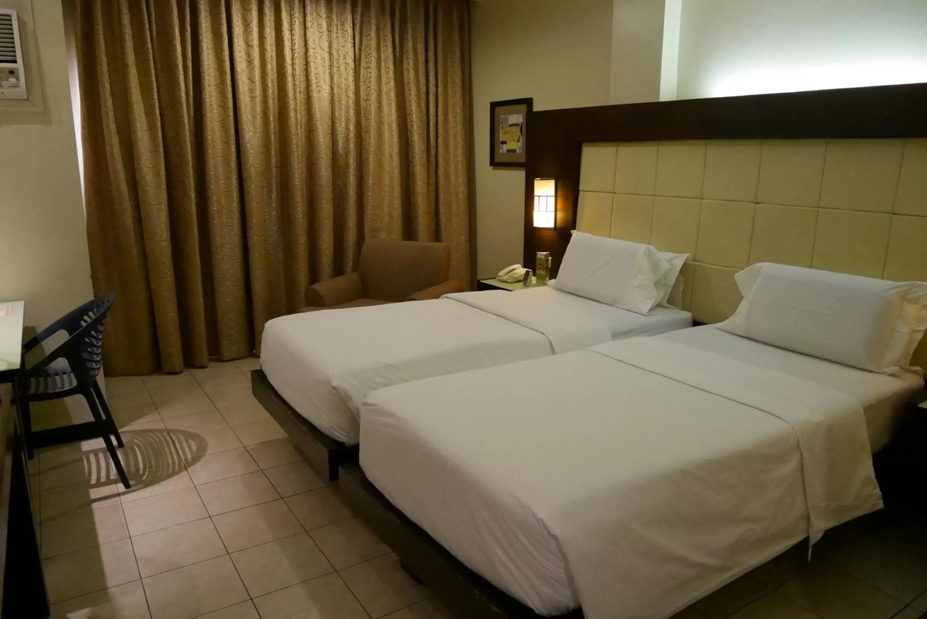 Bedroom, Bed in Circle Inn Hotel and Suites Bacolod