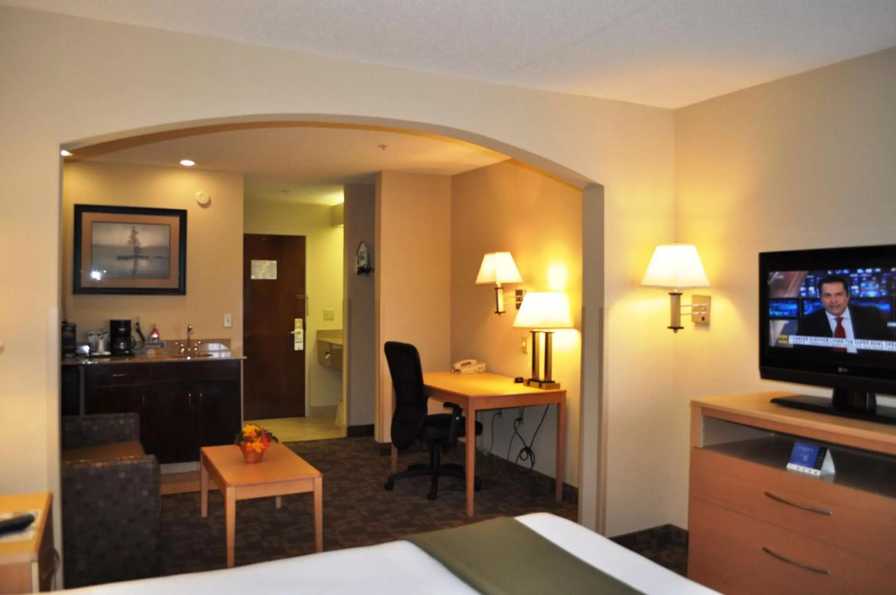 Photo of the whole room, TV/Entertainment Center in SureStay Plus Hotel by Best Western Roanoke Rapids I-95