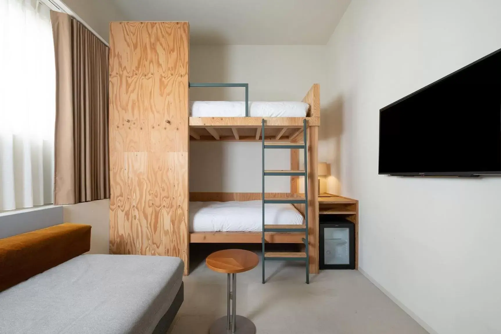 Photo of the whole room, Bunk Bed in KIRO Hiroshima by THE SHARE HOTELS