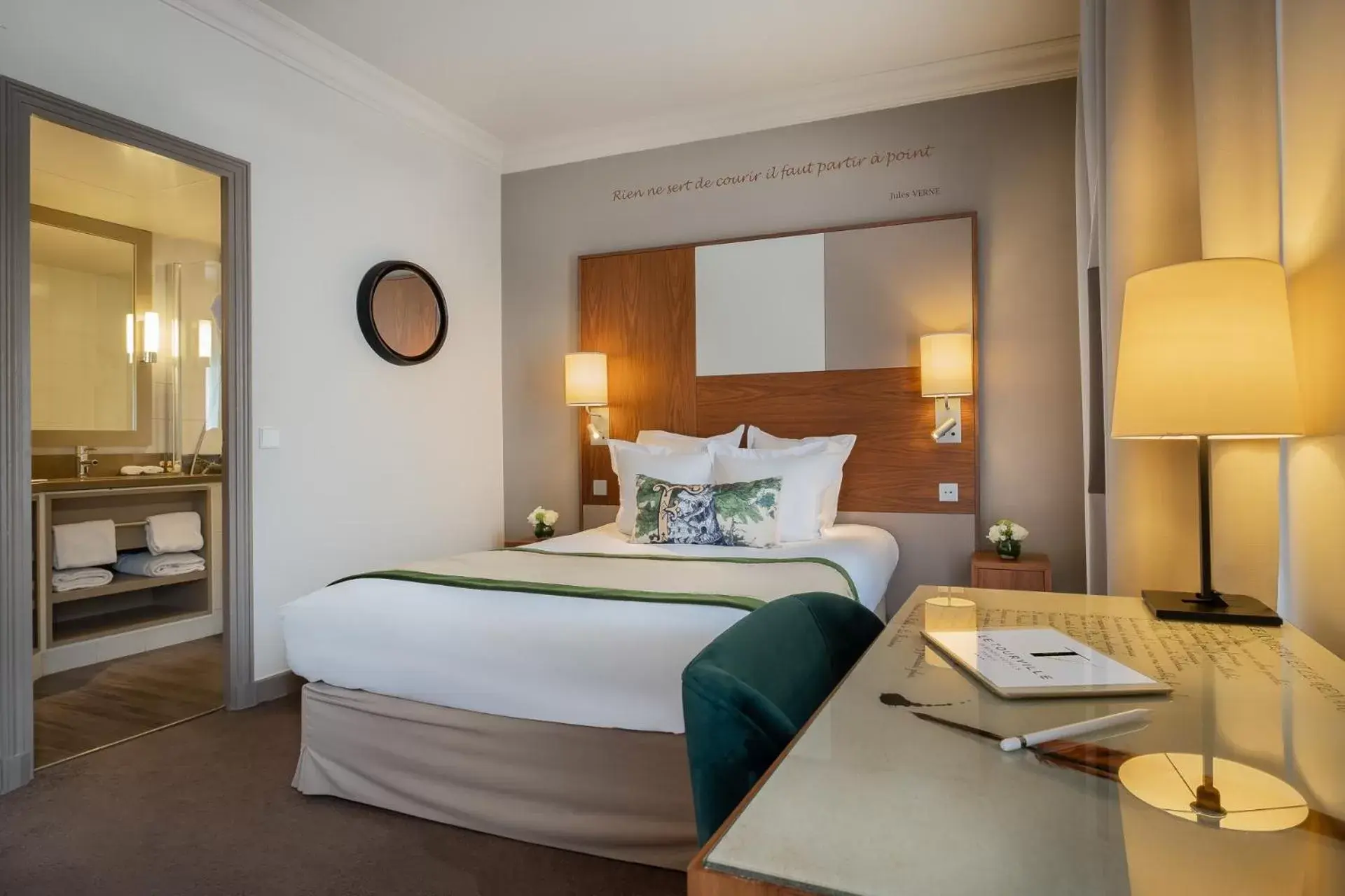 Photo of the whole room, Bed in Hôtel Le Tourville by Inwood Hotels