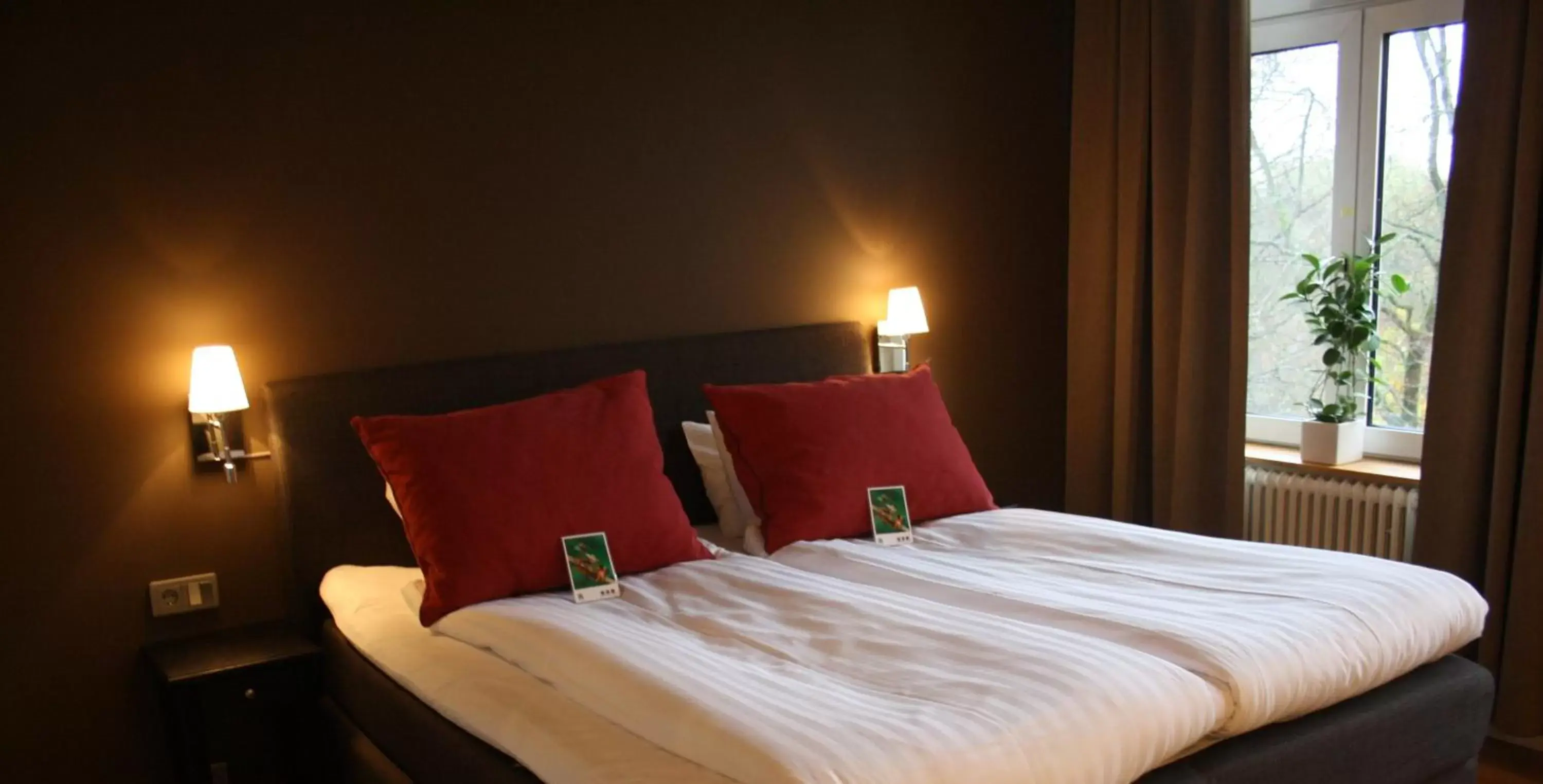 Bed in Clarion Collection Hotel Norre Park