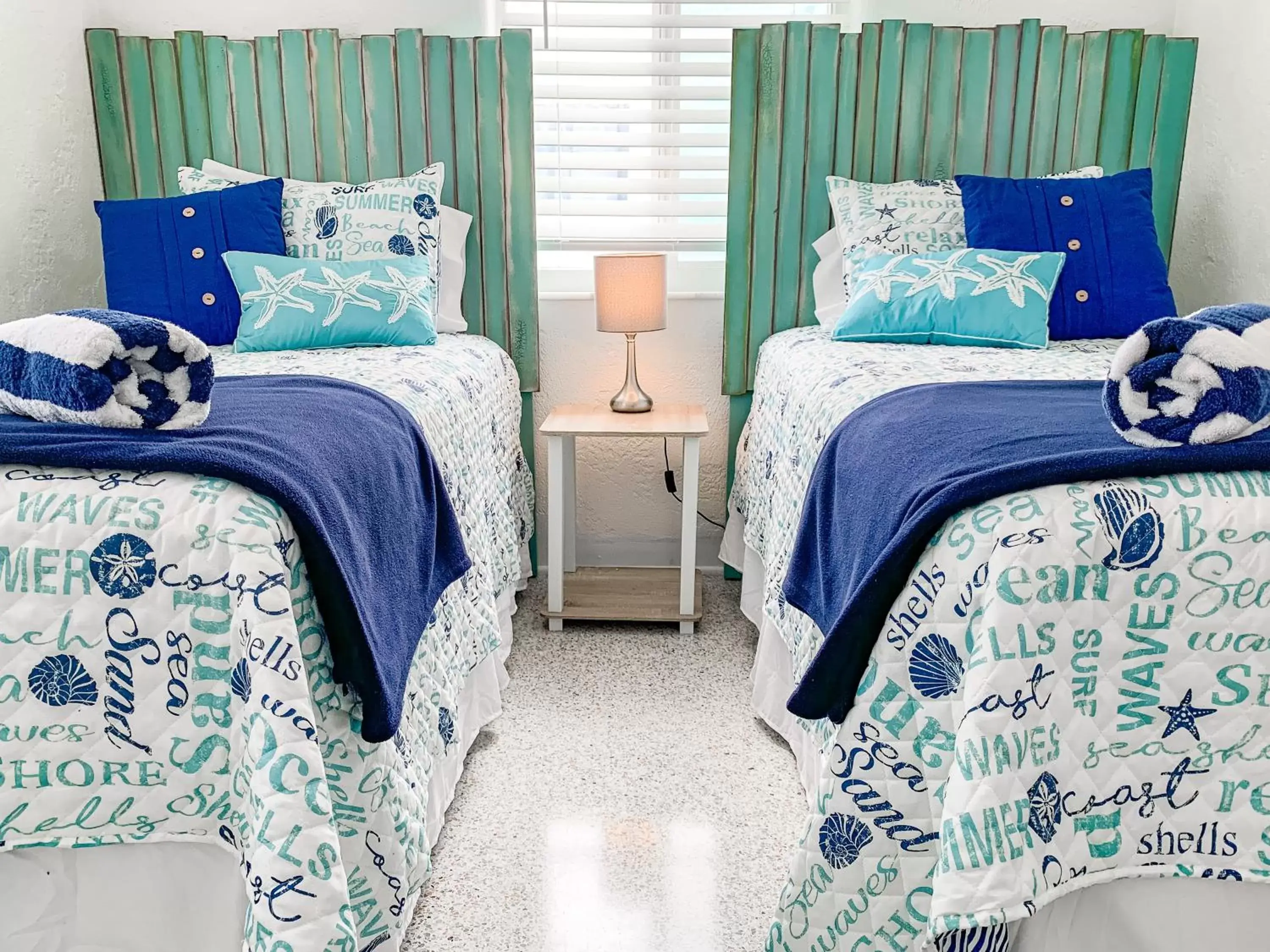 Bed in Ocean Eleven Suites