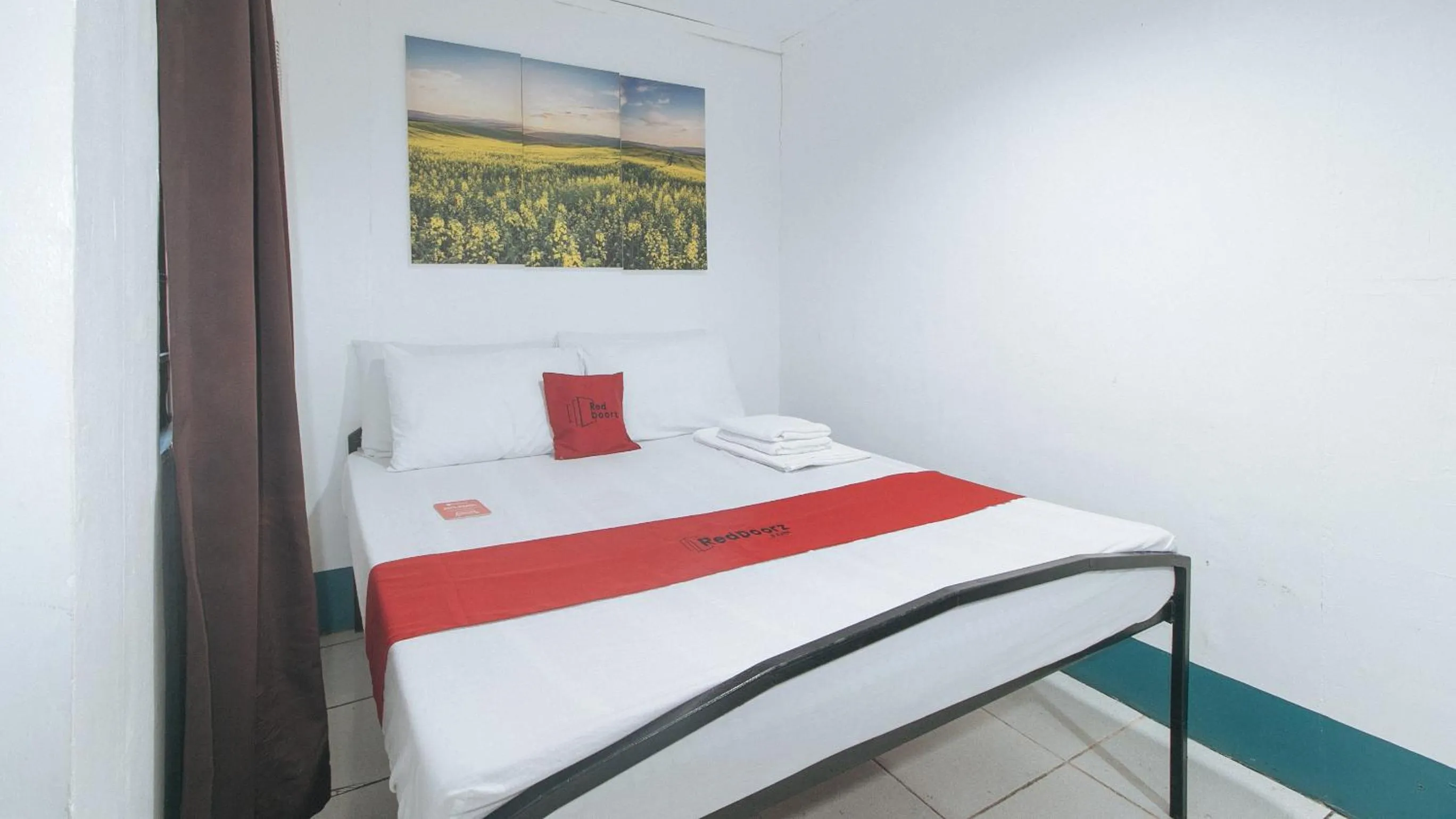 Bed in RedDoorz at Crowne One Condo